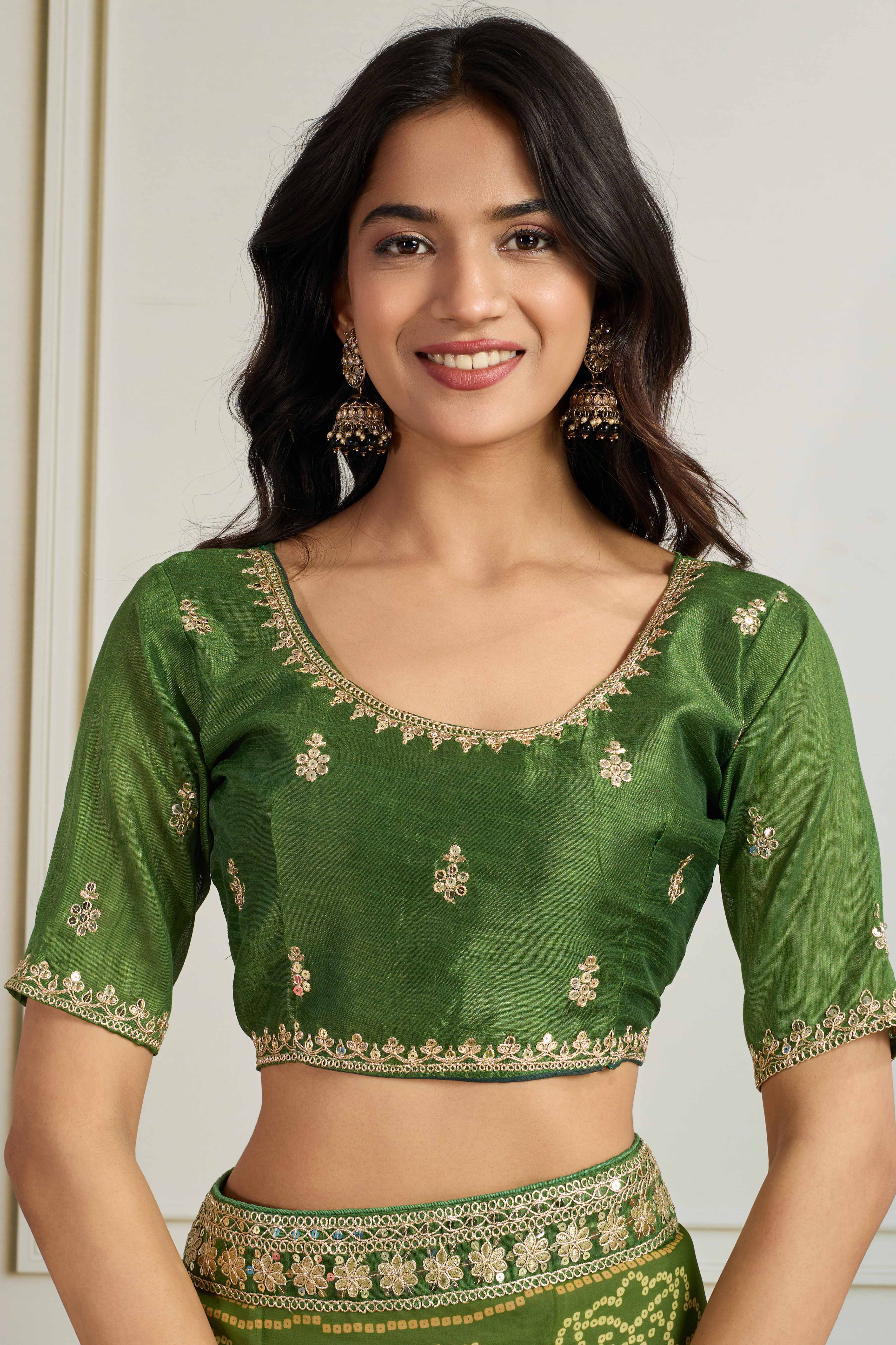 Green Bandhani Digital Printed Georgette Saree Enhanced With Cording Embroidered Border