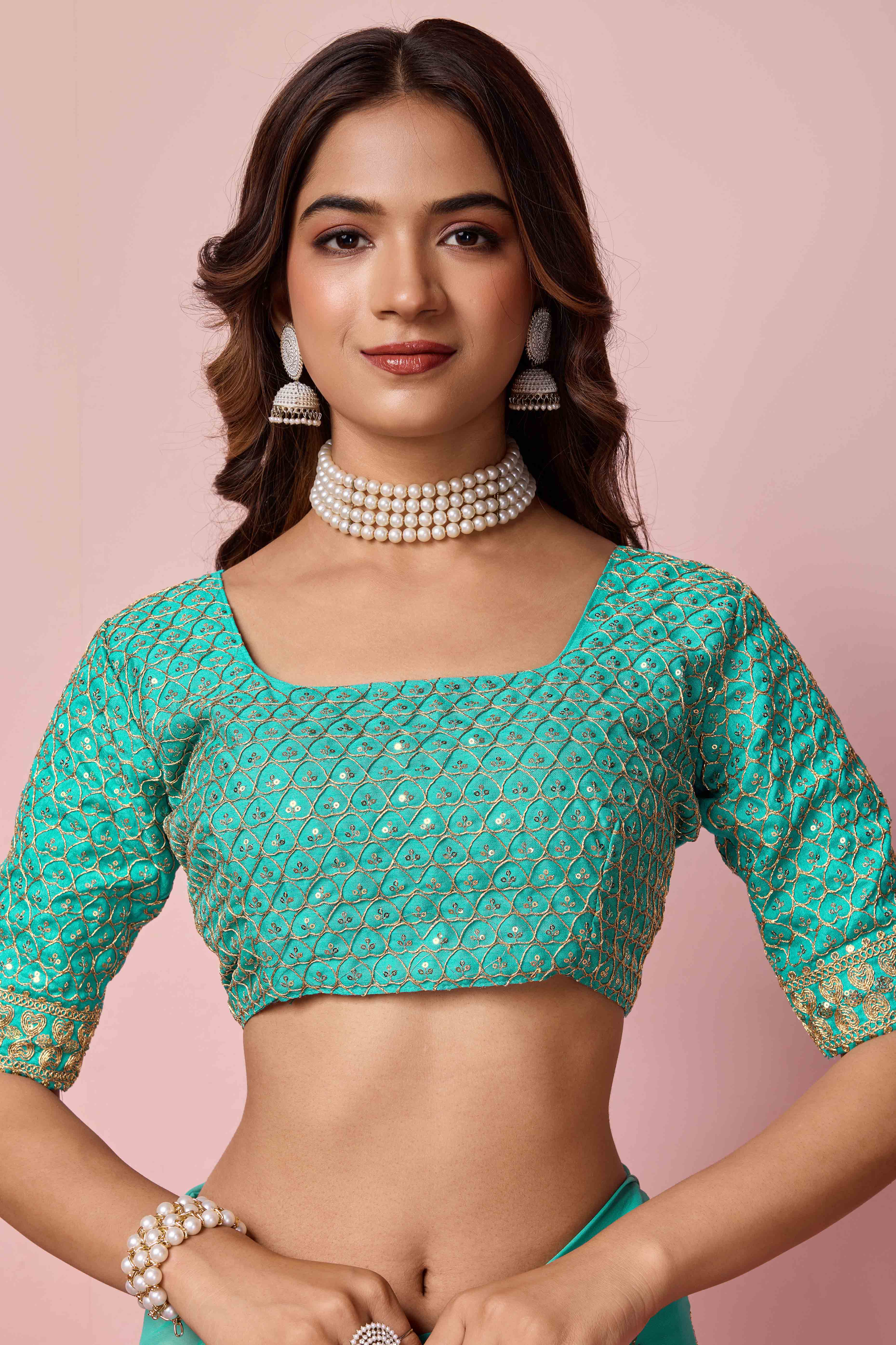 Turquoise Sequins Embroidered Georgette Saree