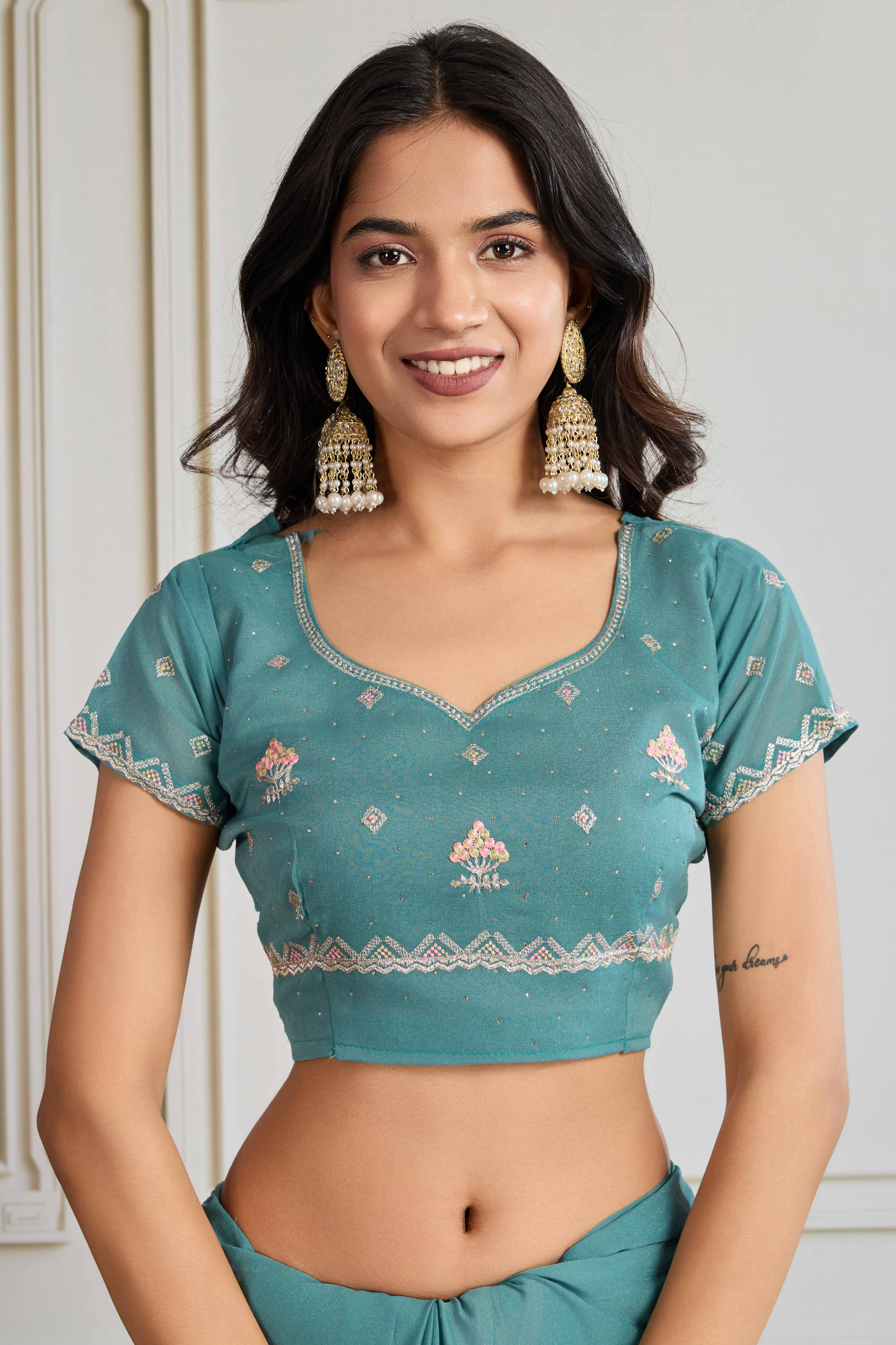 Teal Georgette Saree Featuring Embroidered and Stone Work