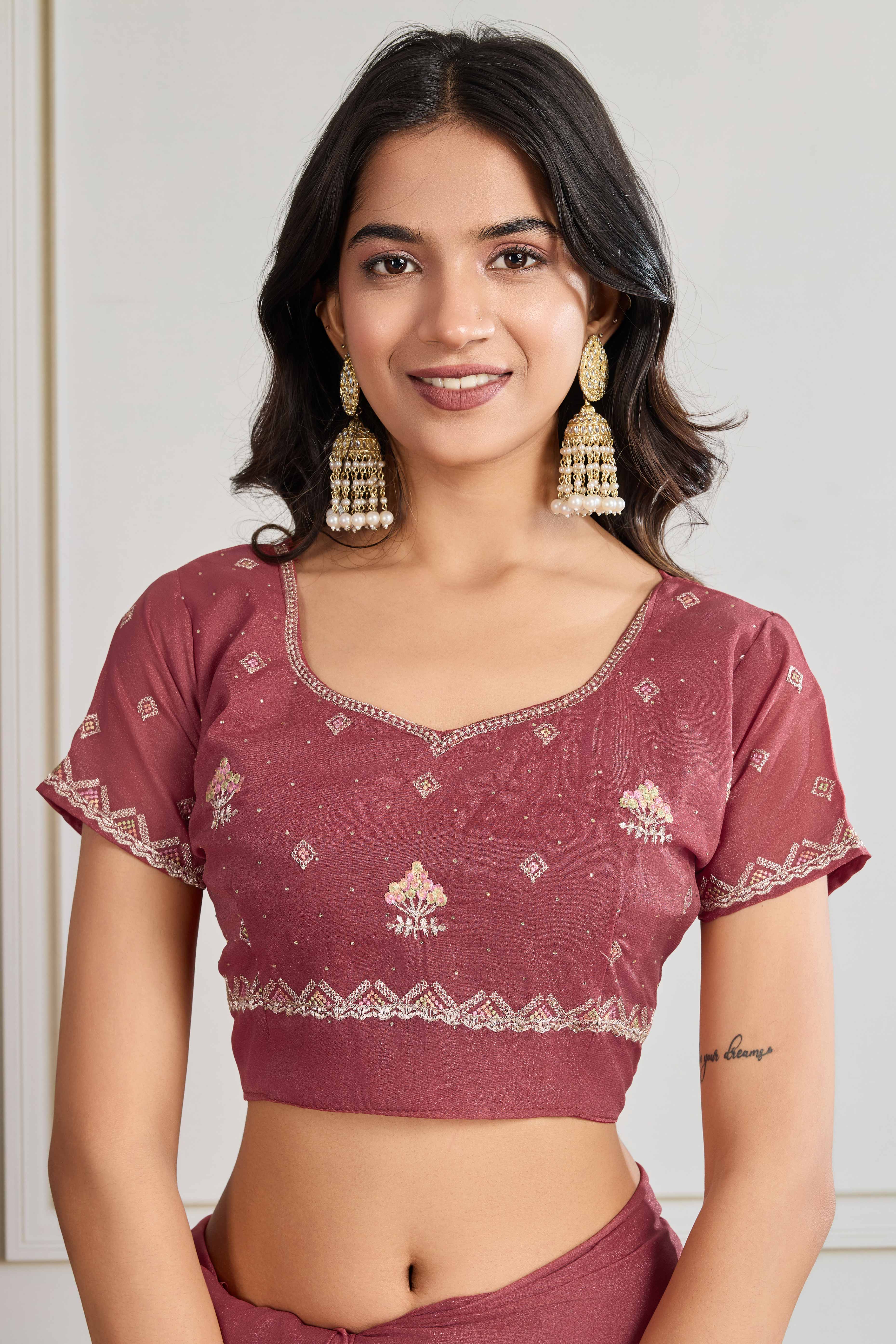 Mauve Georgette Saree Featuring Embroidered and Stone Work