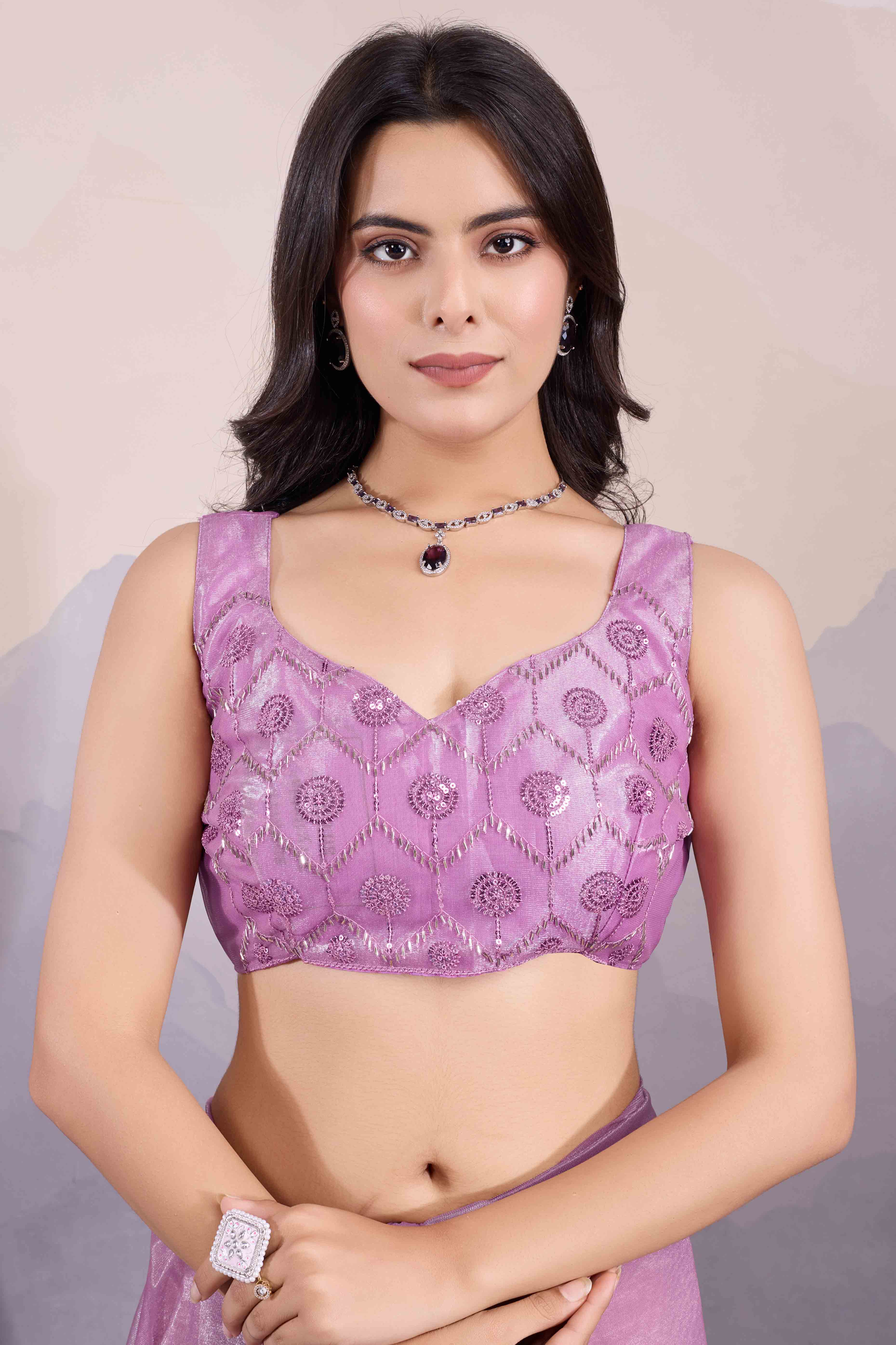 Mauve Sequins Embroidered Twill Net Saree