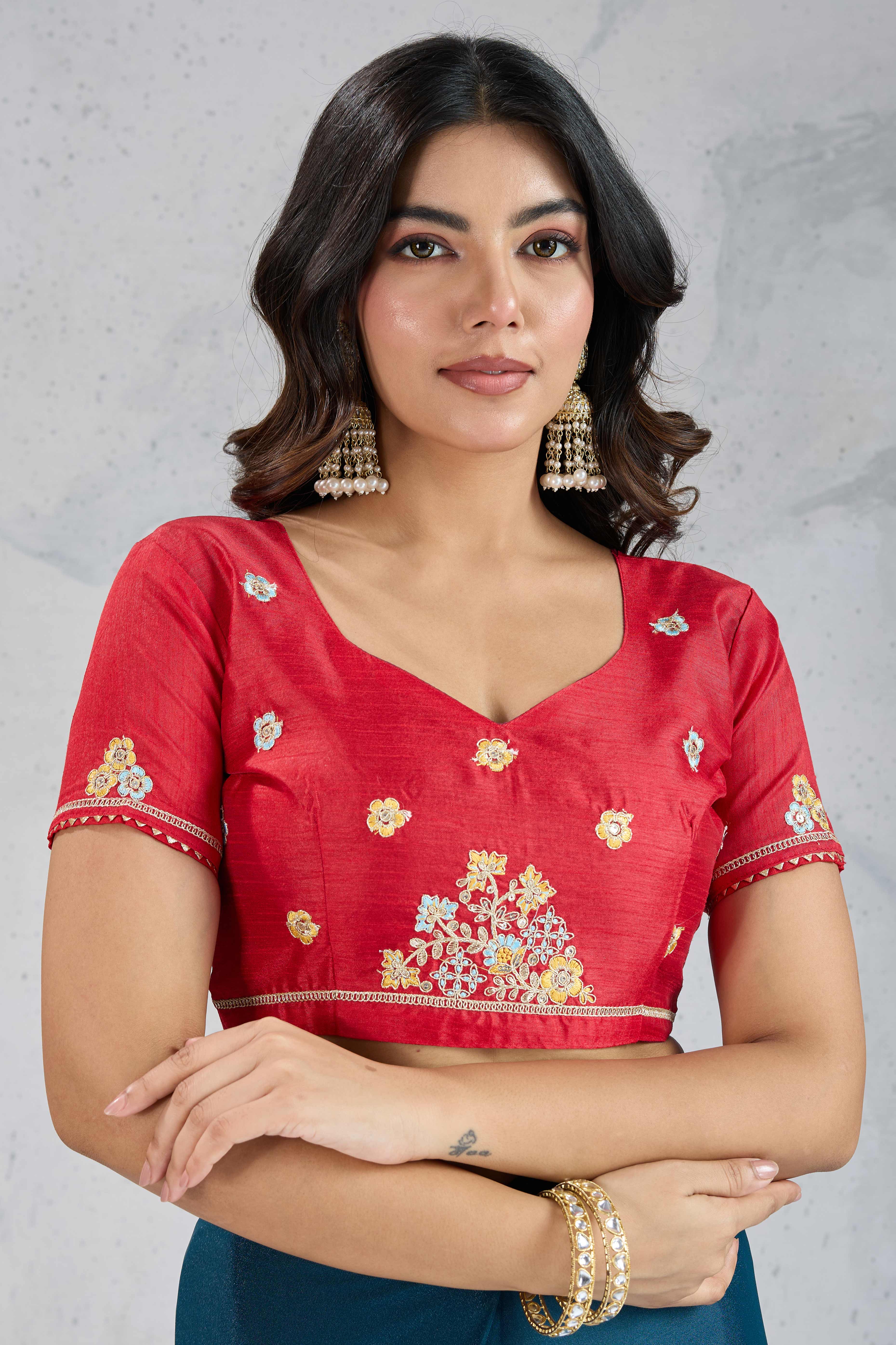 Teal Embroidered Saree with Ethnic Detailing in Georgette Fabric