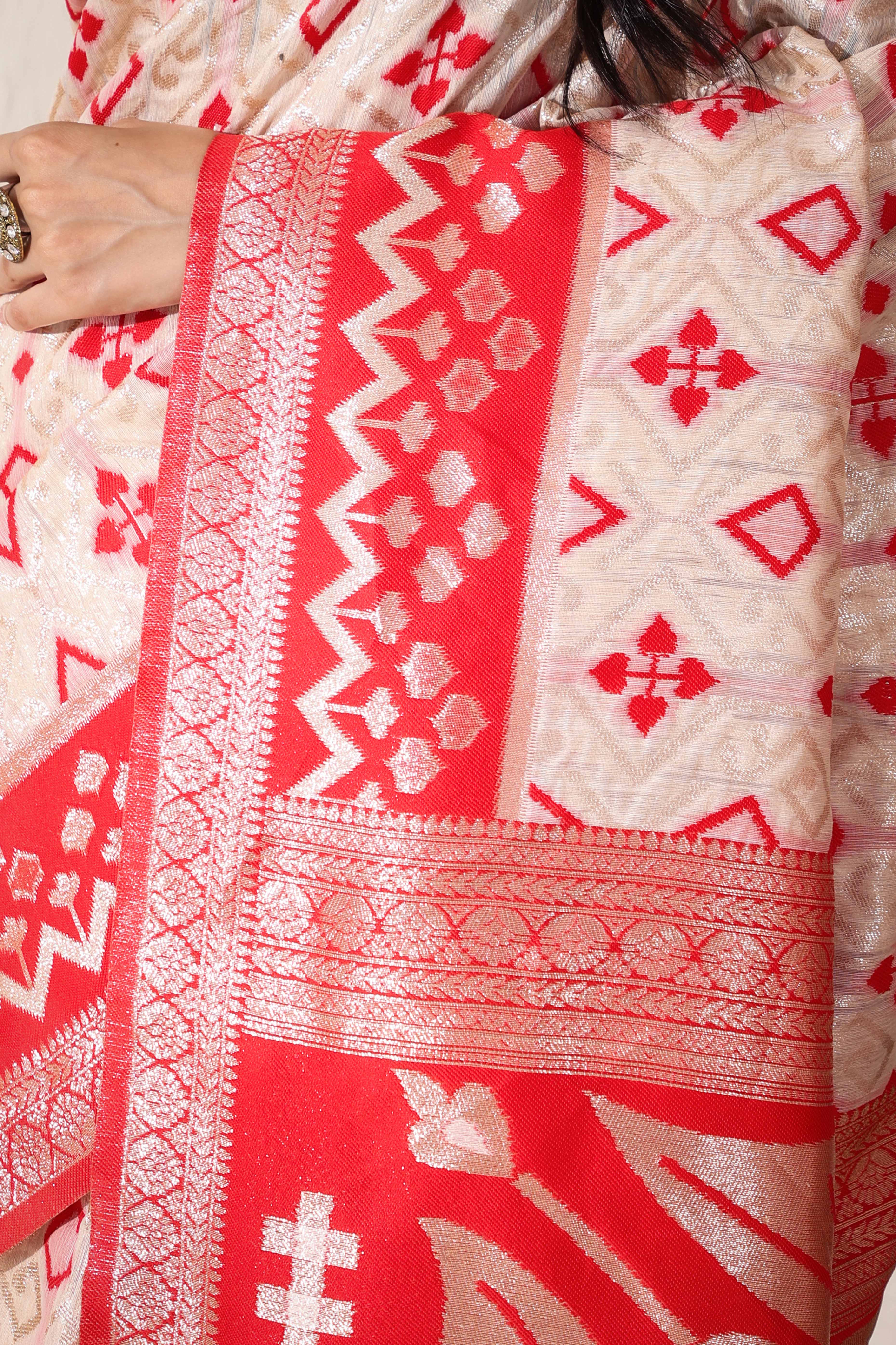 Graceful White & Red Saree In Linen Cotton With Fine Zari Weaving And Flowing Tassel Details