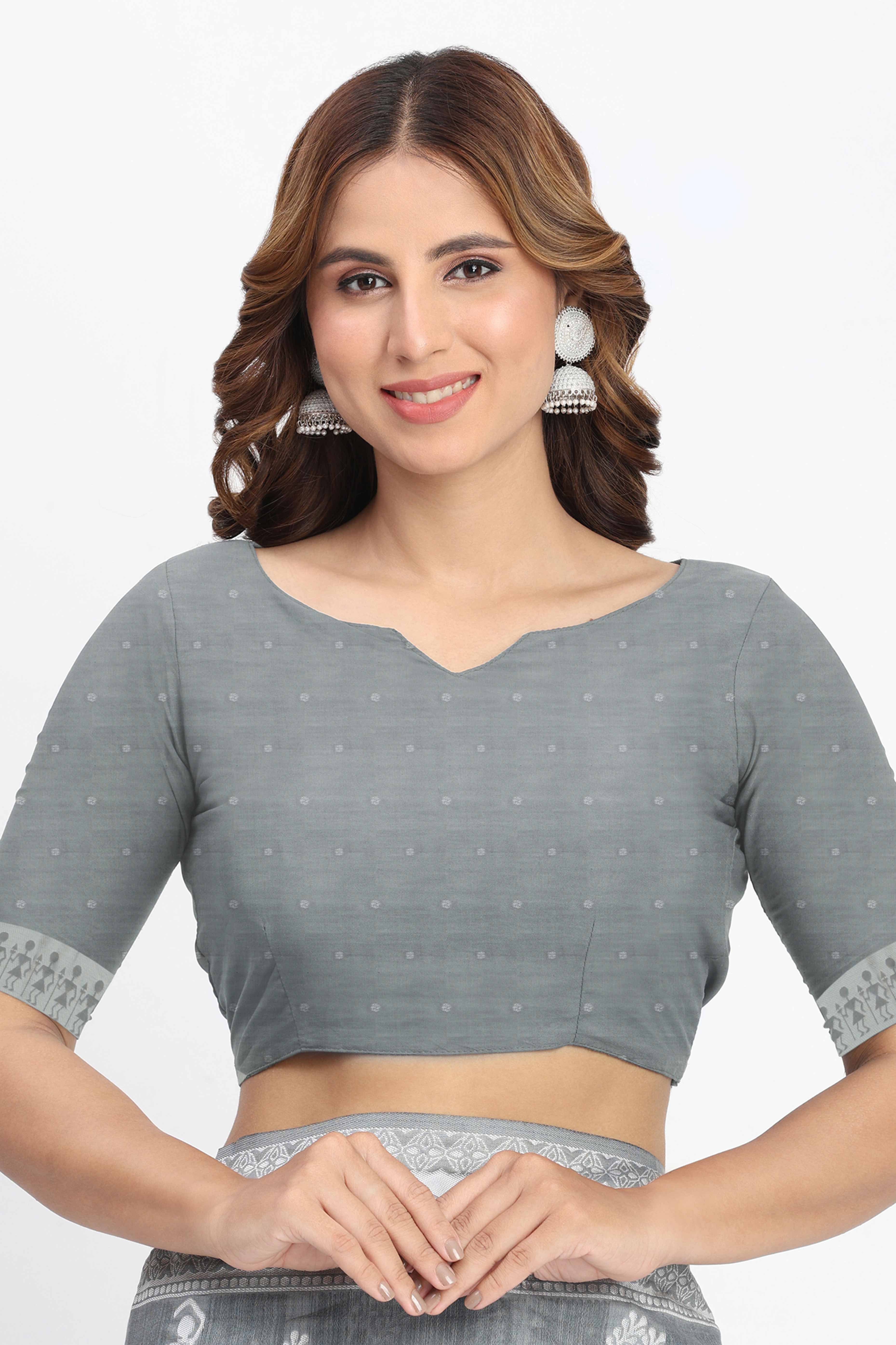 Grey Linen Cotton Saree Showcasing Traditional Warli Motifs In Zari Weaving With Tassel Pallu