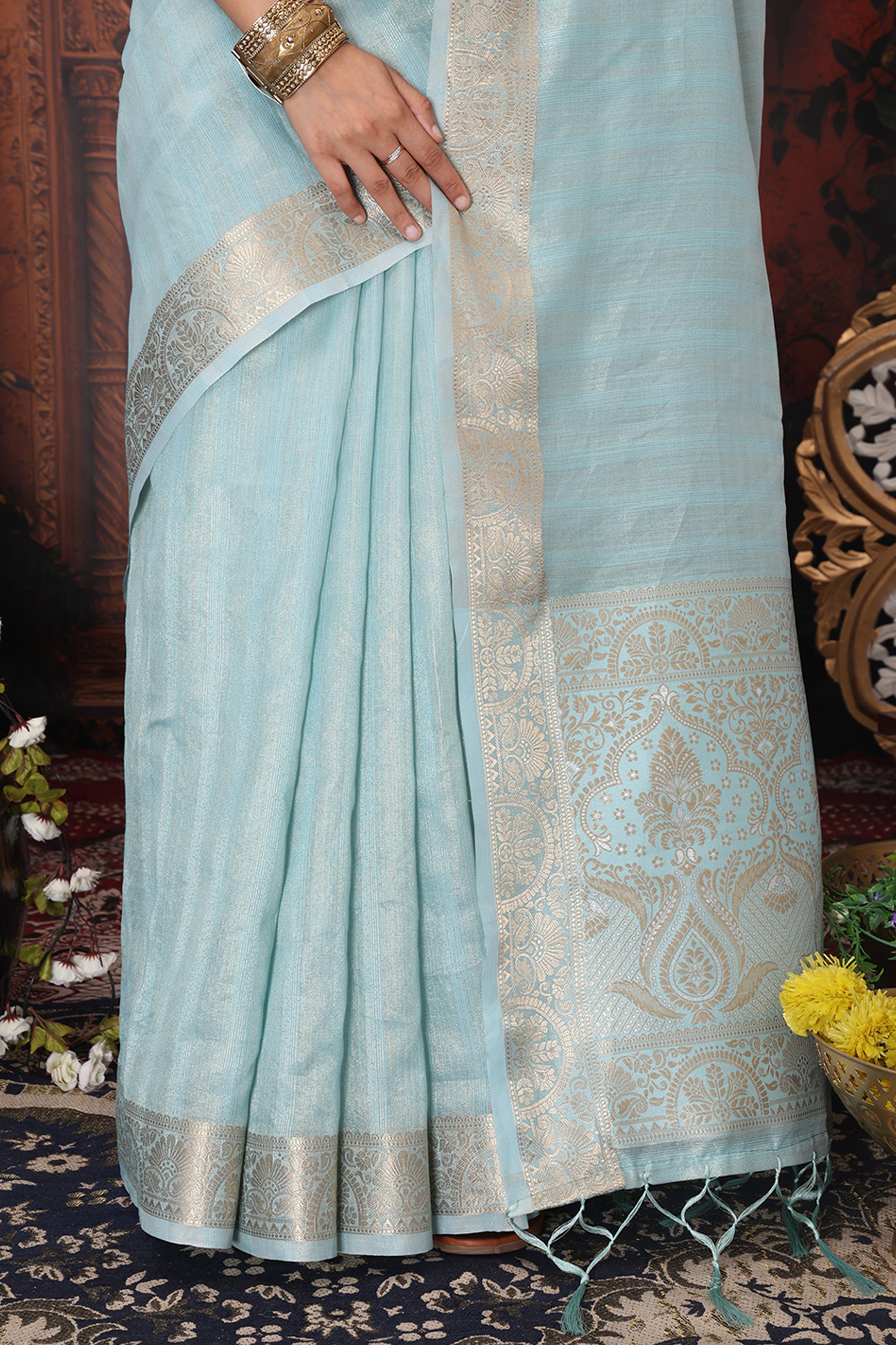 Sky Blue Organza Saree Adorned With Floral Zari Weaving & Graceful Tassel Pallu