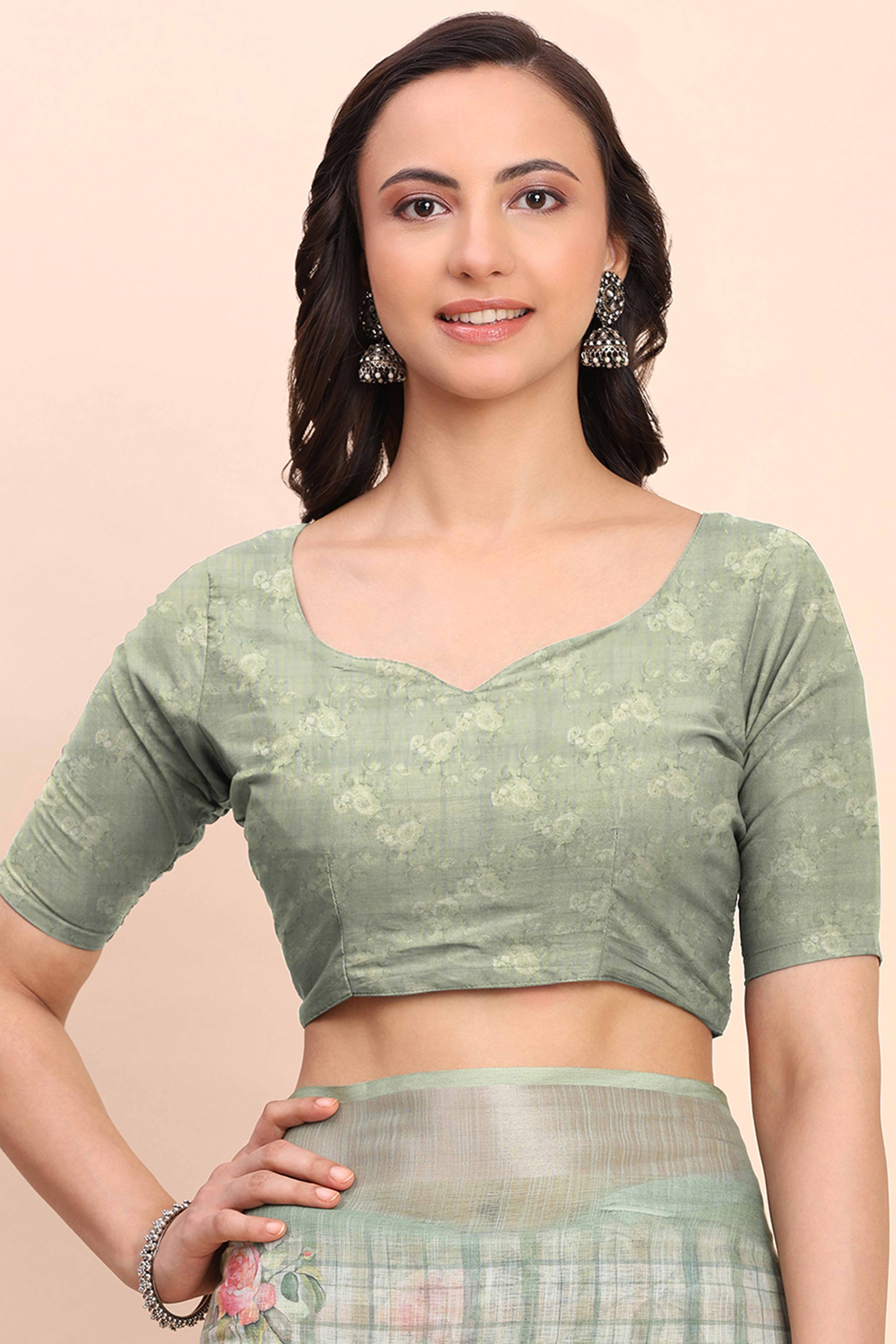 Sea Green Linen Cotton Saree Featuring Floral Prints & Woven Border