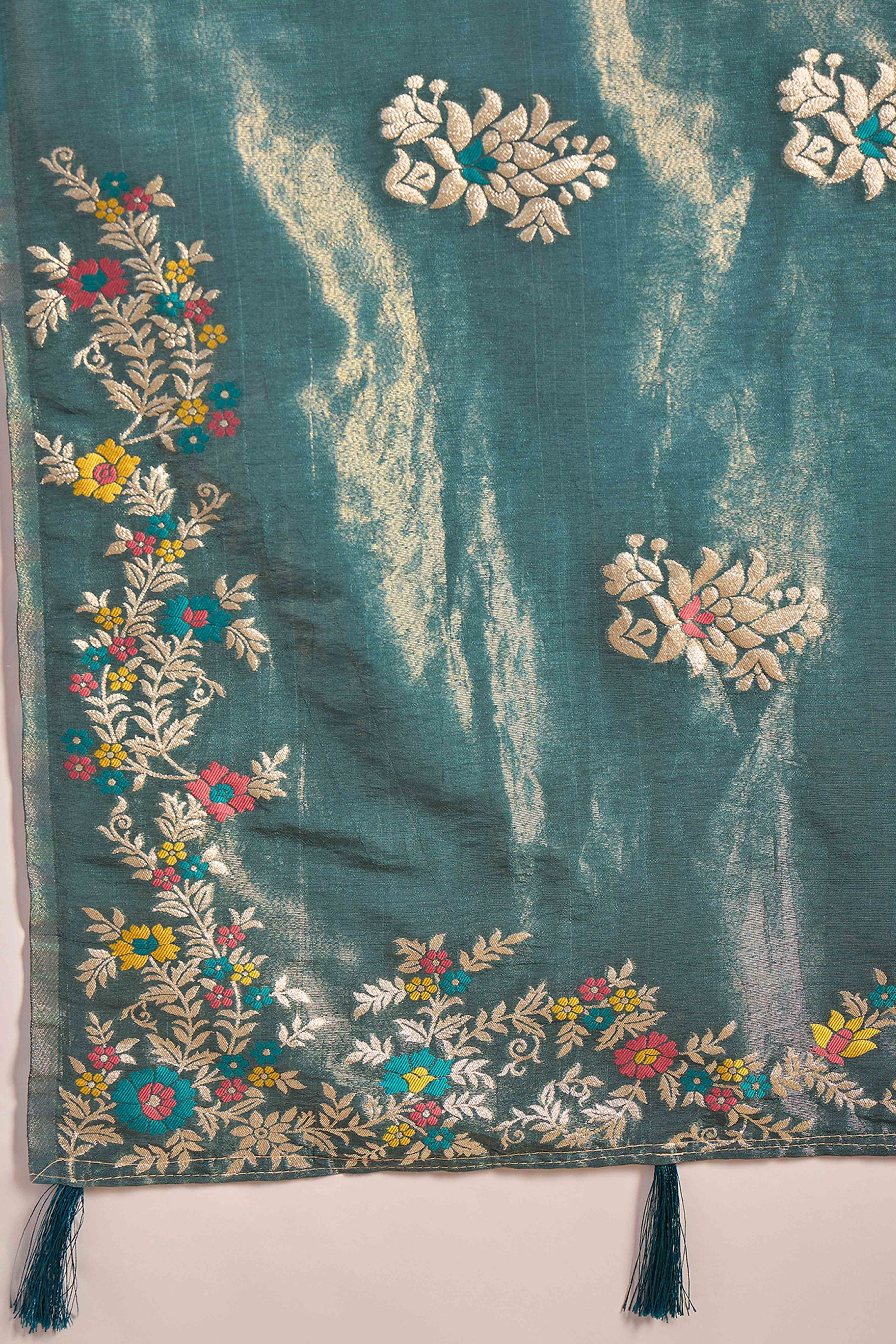 Teal Shimmer Saree Showcasing Floral Zari Weaving & A Tasselled Pallu