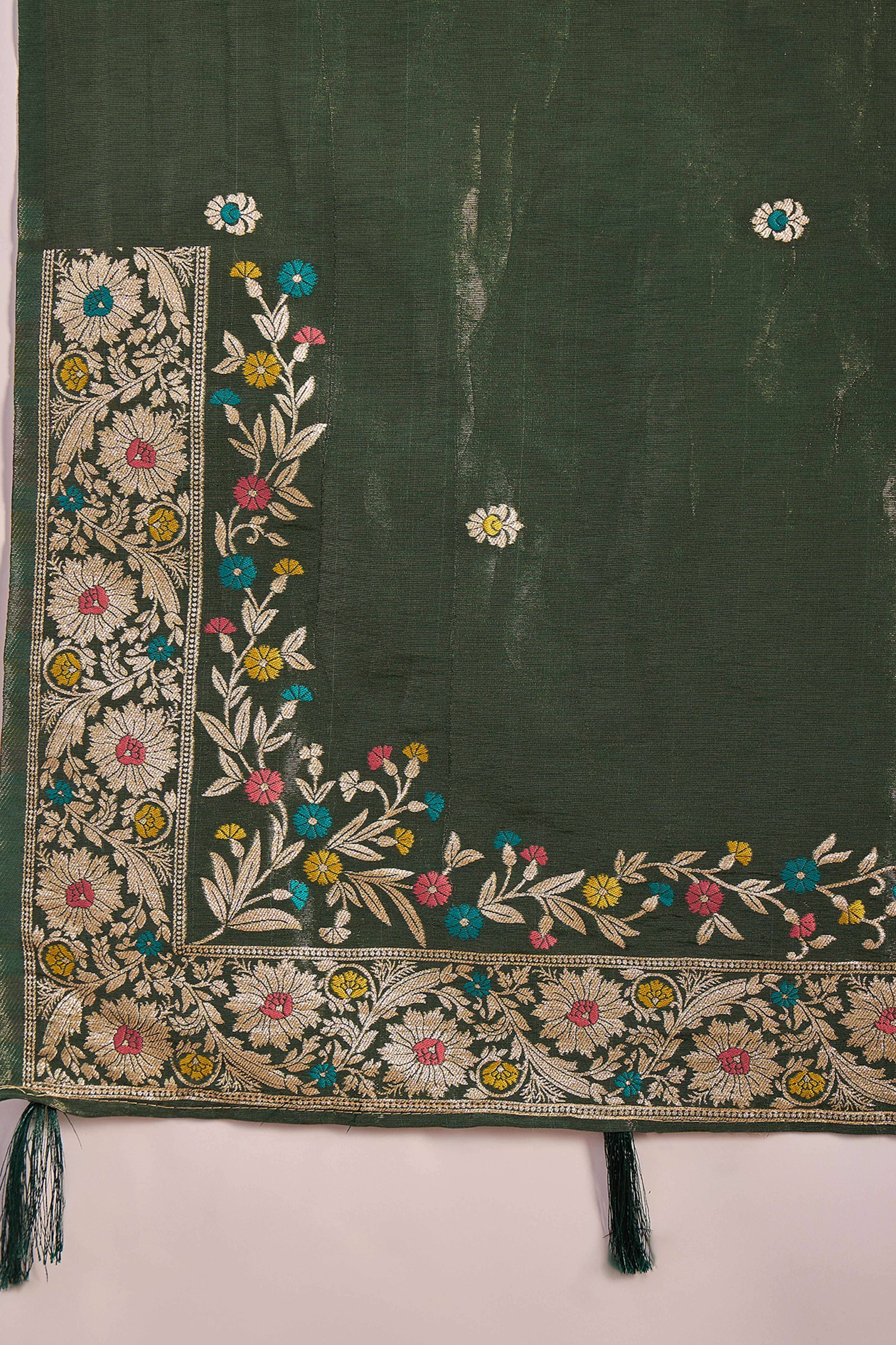 Green Zari Woven Shimmer Saree With Floral Motifs & Flowing Tassel Pallu