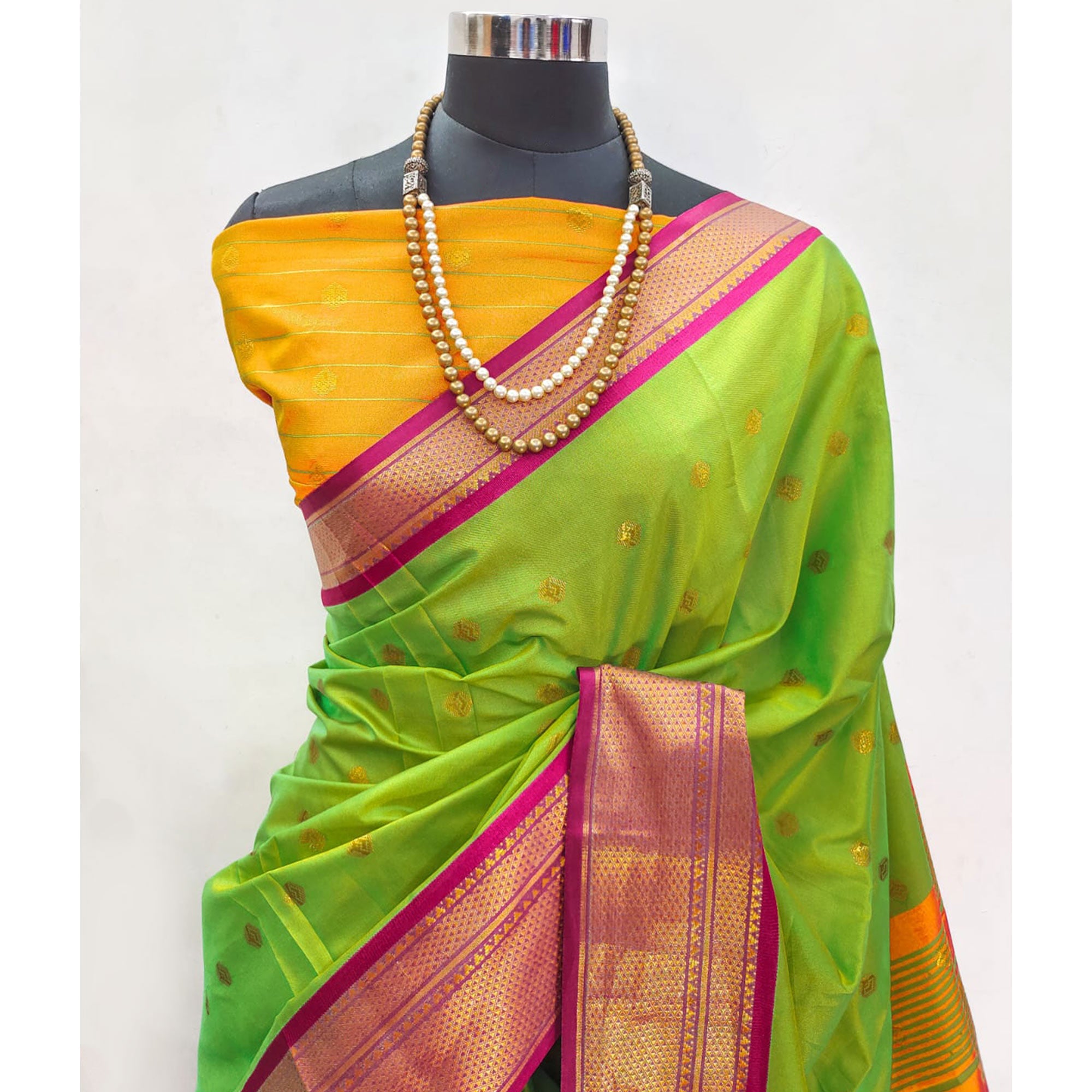 Green Zari Woven Lichi Art Silk Saree With Tassels