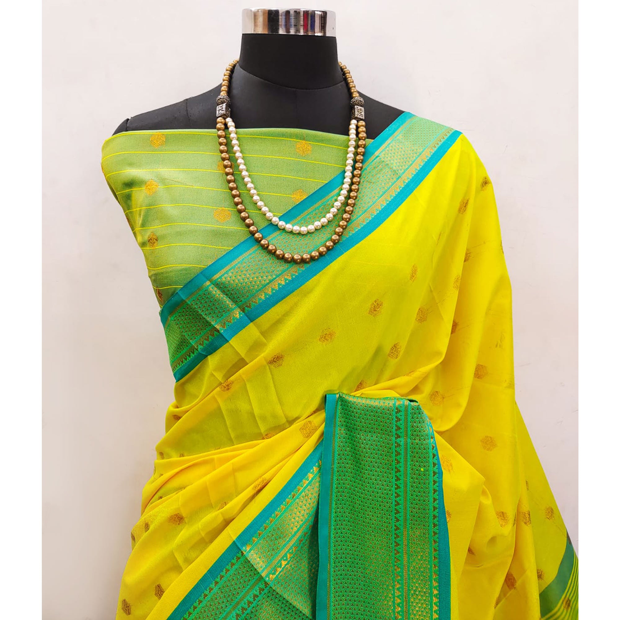 Lemon Yellow Zari Woven Lichi Art Silk Saree With Tassels