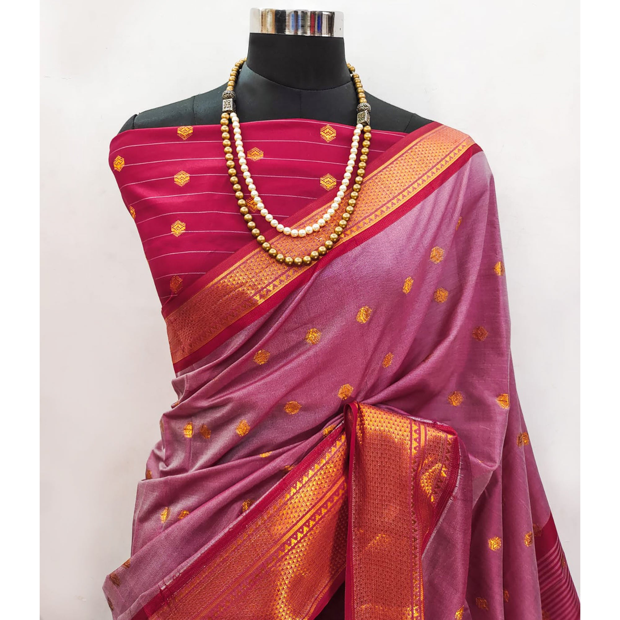 Pink Zari Woven Lichi Art Silk Saree With Tassels