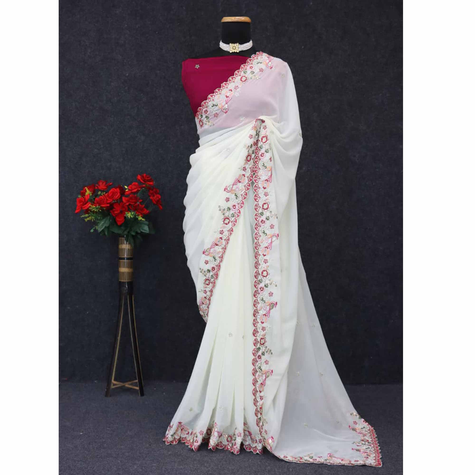Stylish Off White Georgette Partywear Saree with Beautifully Embroidered Border Detailing