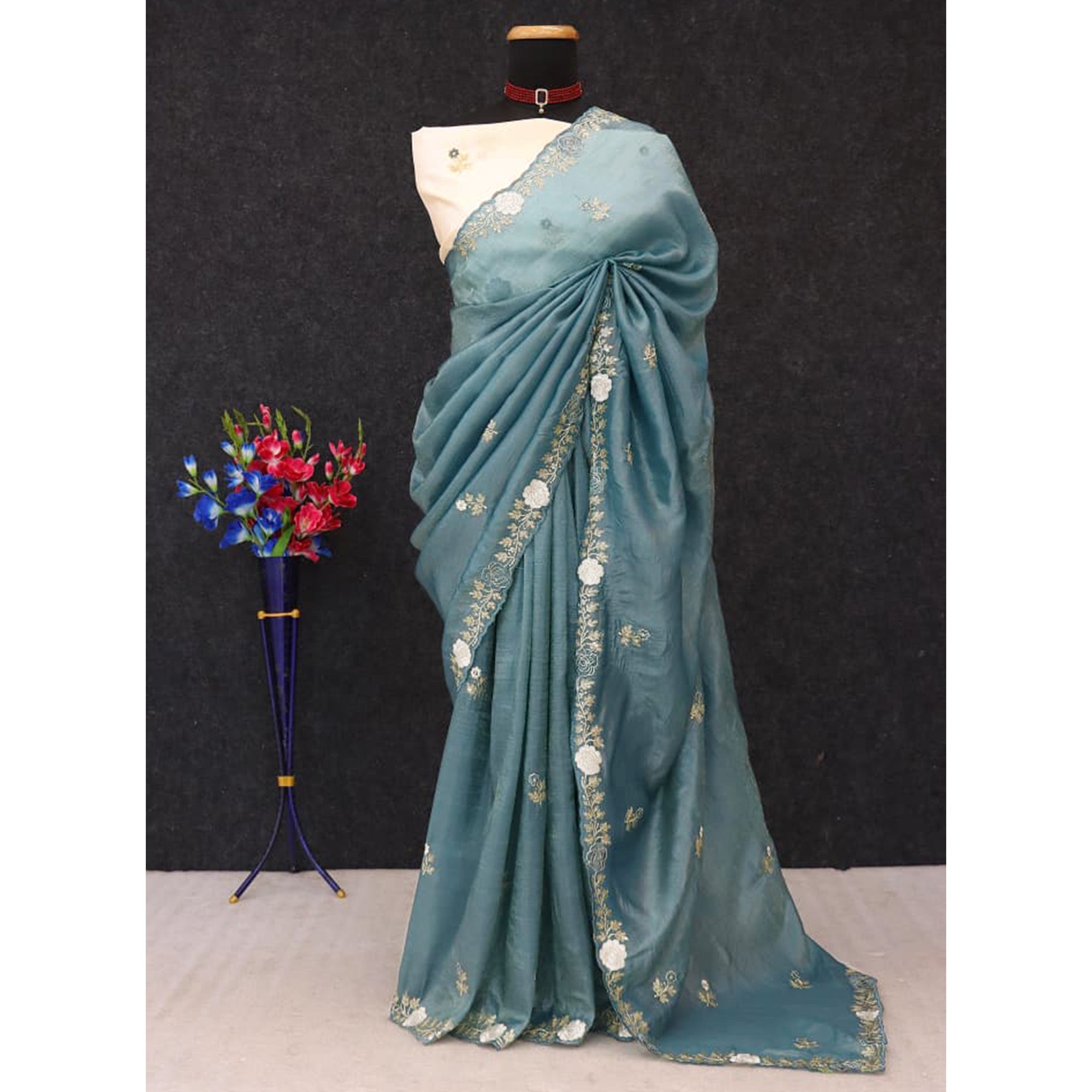 Blue Lightweight Georgette Crush Saree Adorned with Delicate Floral Embroidery