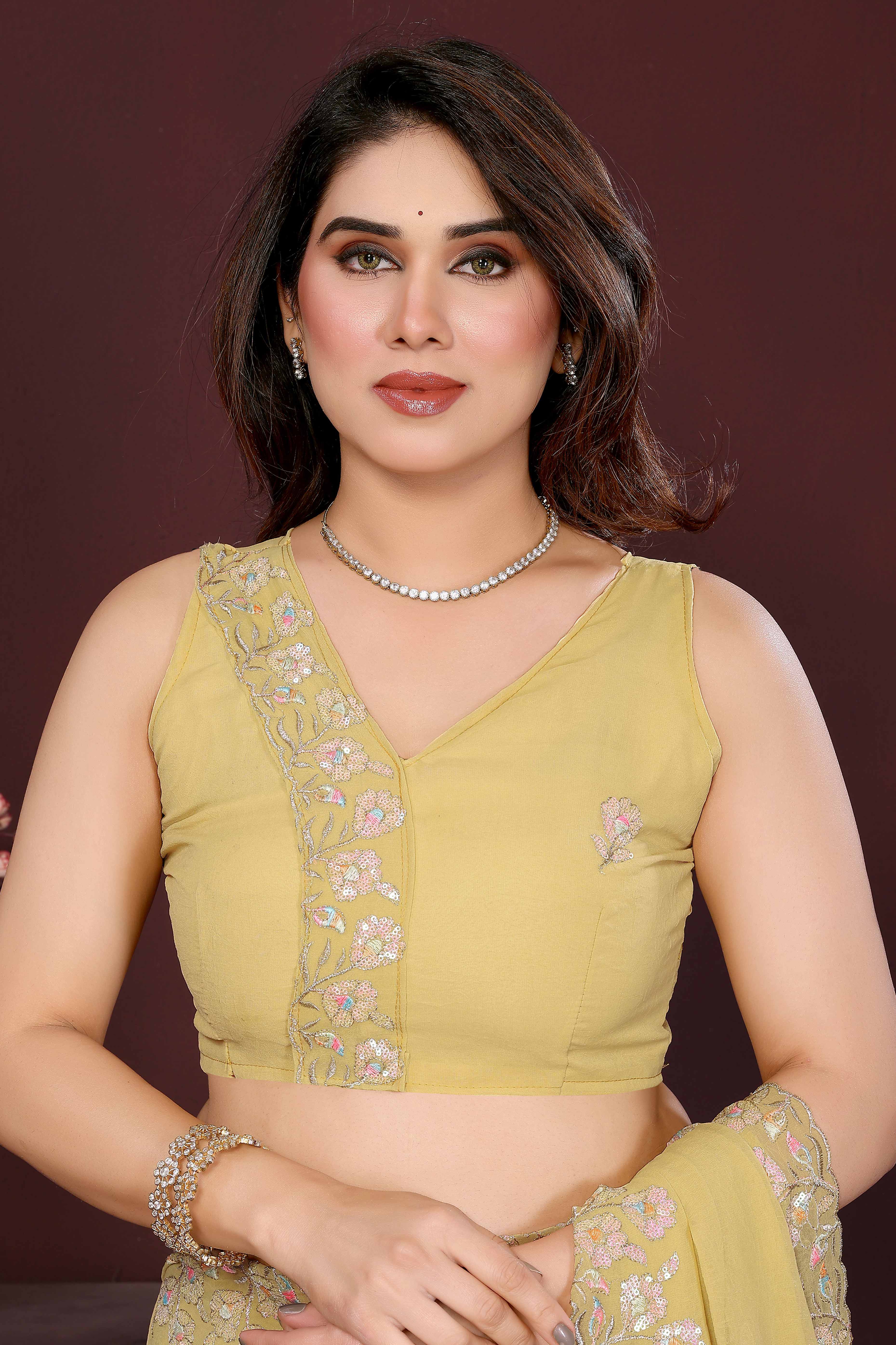 Yellow Georgette Saree Featuring Intricate Floral Sequin Embroidery