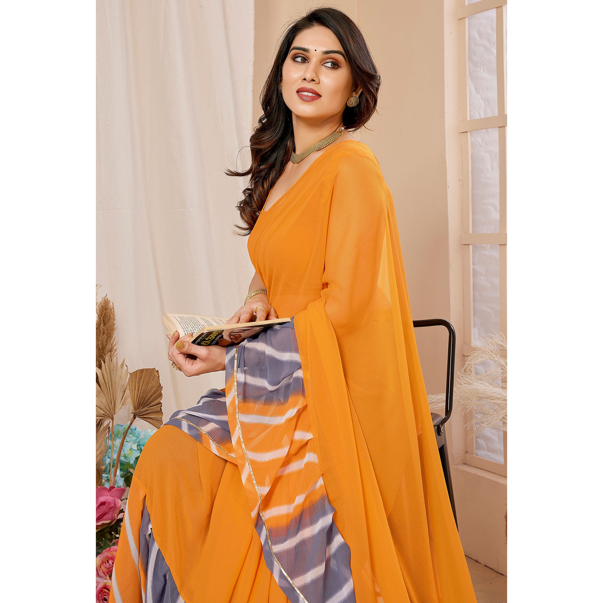 Orange Solid Georgette Saree With Printed Ruffle Border