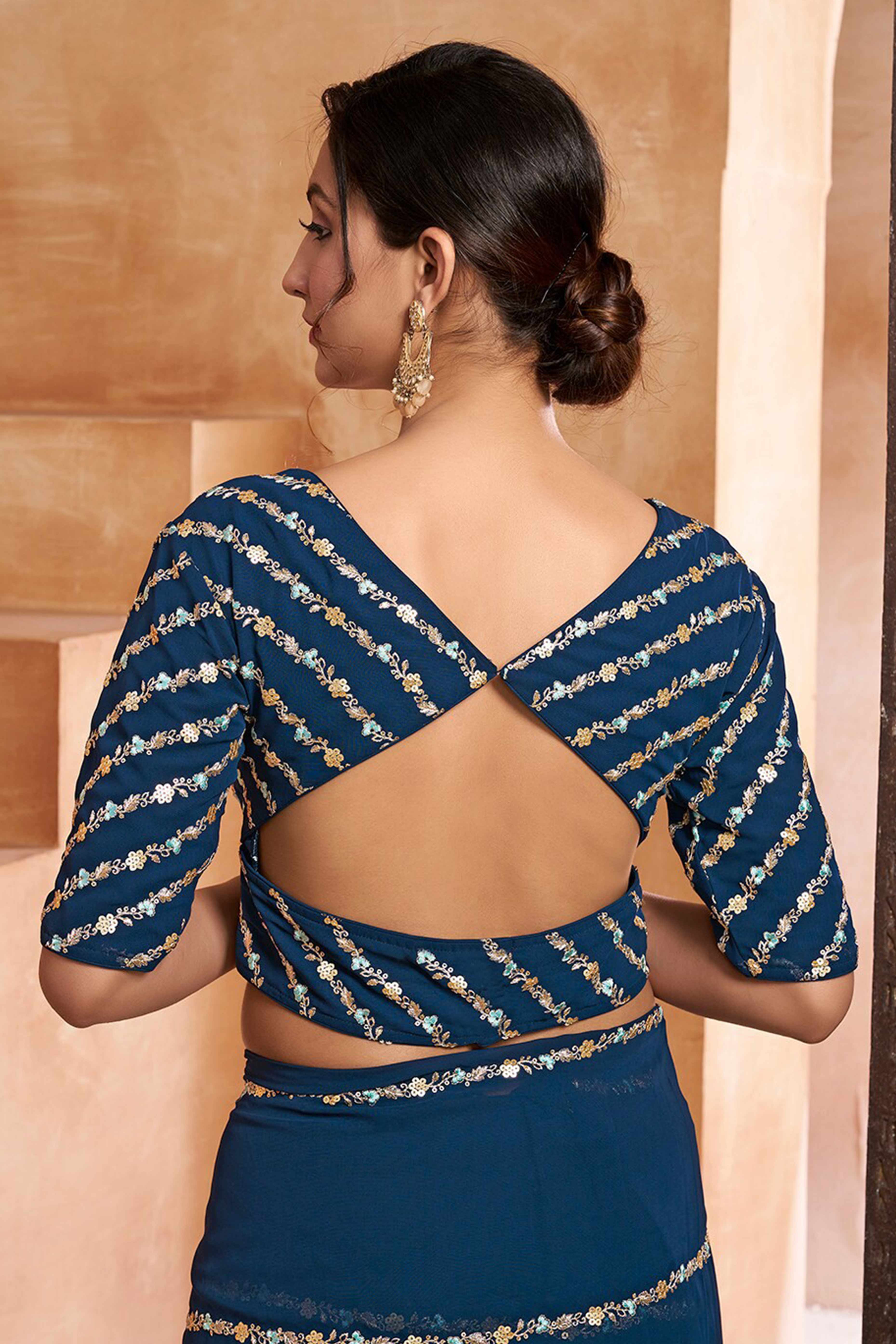 Graceful Blue Floral Georgette Saree Embellished With Fine Sequins Embroidery