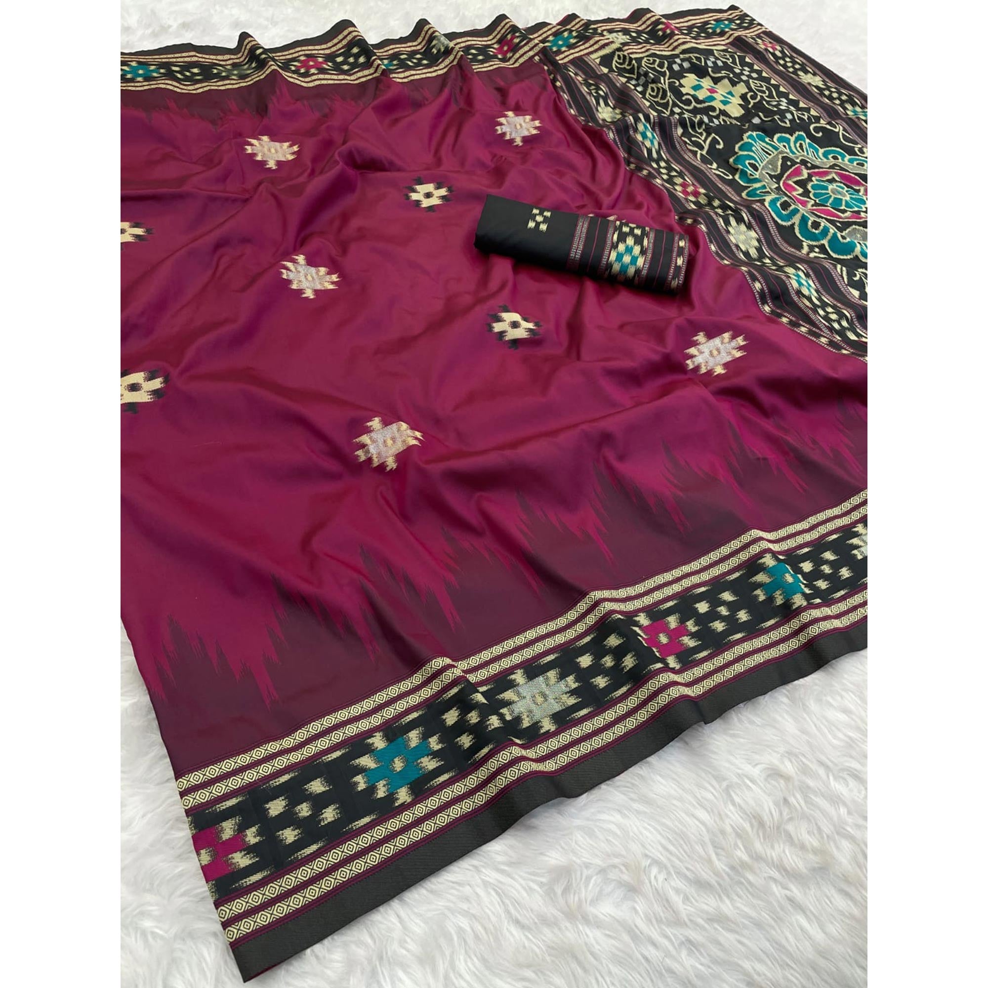 Magenta Art Silk Saree Adorned with Intricate Patola Style Woven Designs