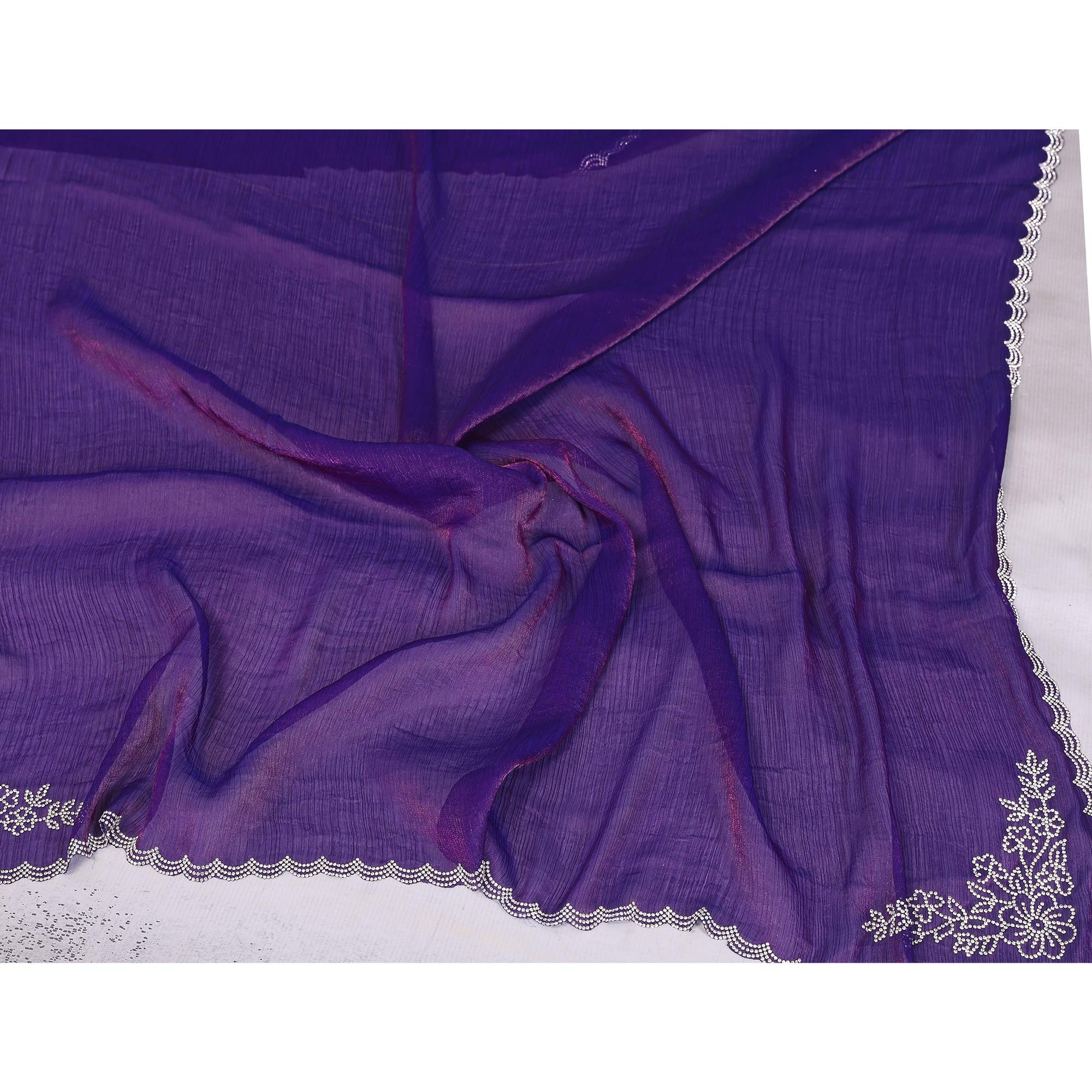Violet Partywear Chiffon Saree Featuring Intricate Swarovski Stone Embellishment