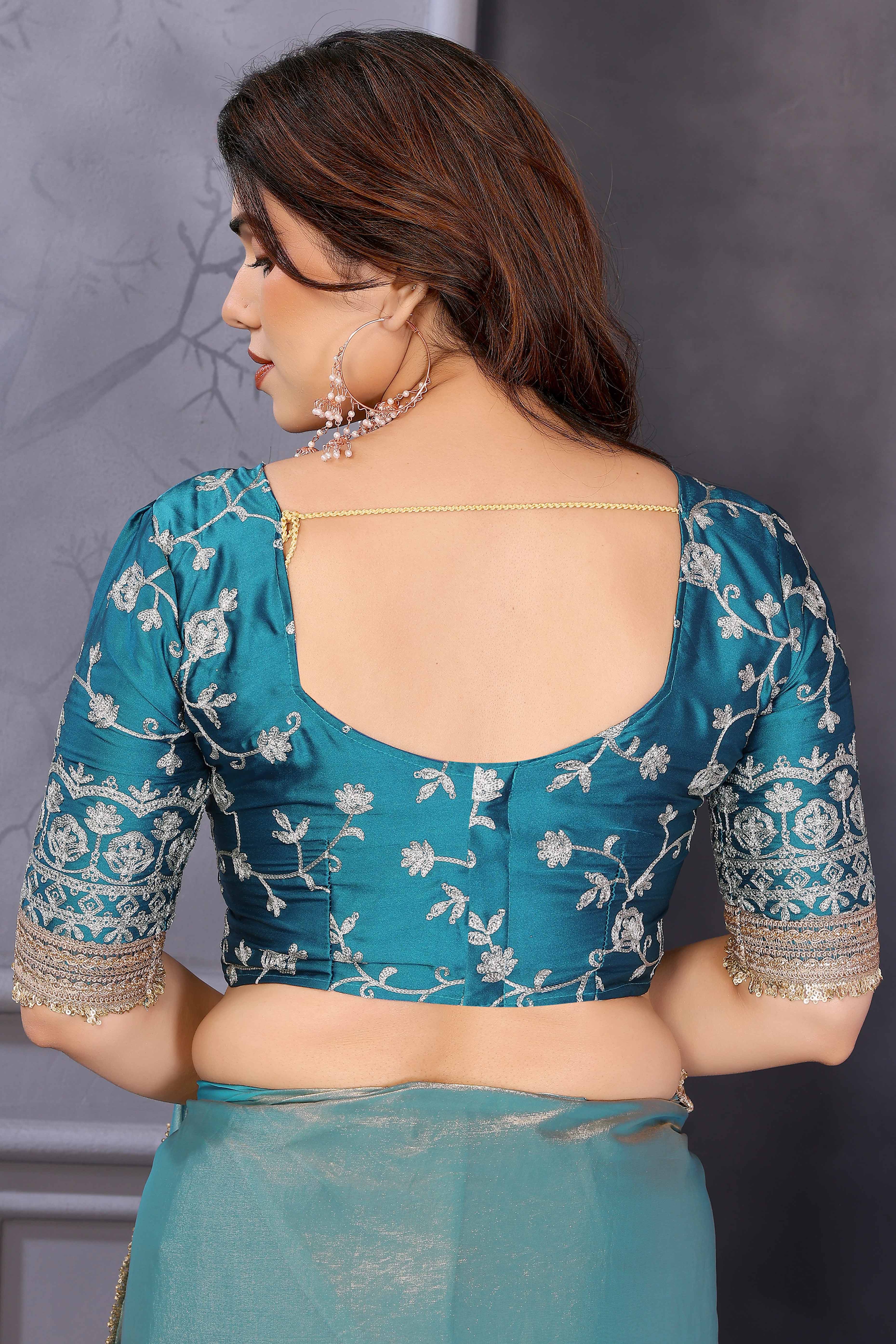Teal Satin Saree with Solid Body and Decorative Lace Embellished Border – A Modern Ethnic Staple