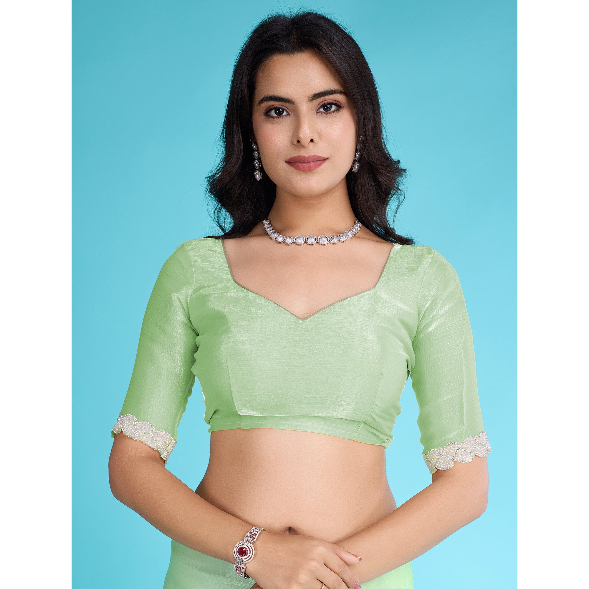 Green Solid With Zarkan & Ceramic Pearl Diamond Lace Tissue Saree