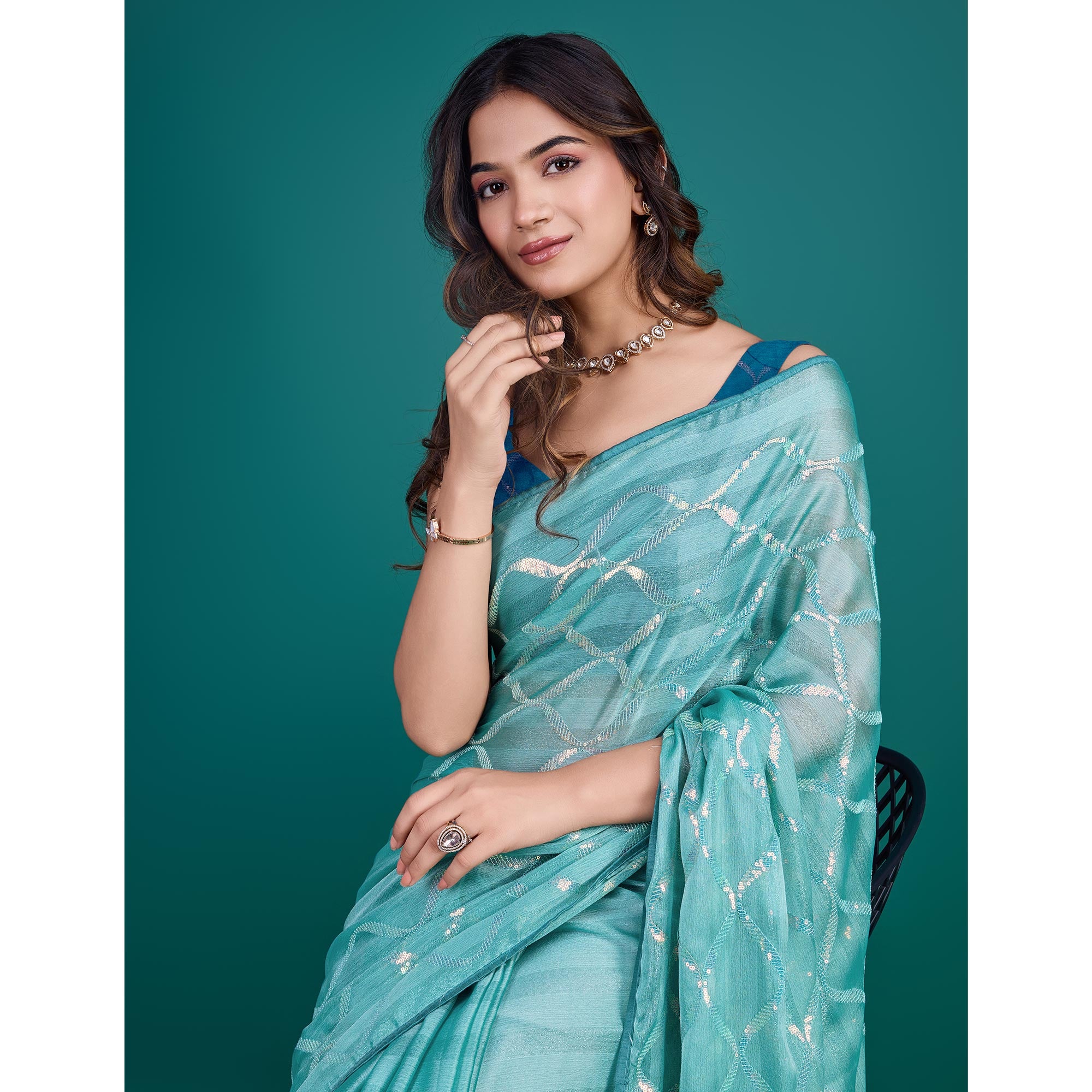Turquoise Sequins Embroidered Georgette Saree