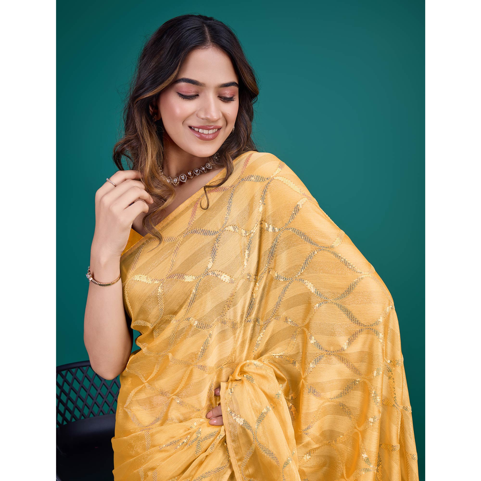 Yellow Sequins Embroidered Georgette Saree