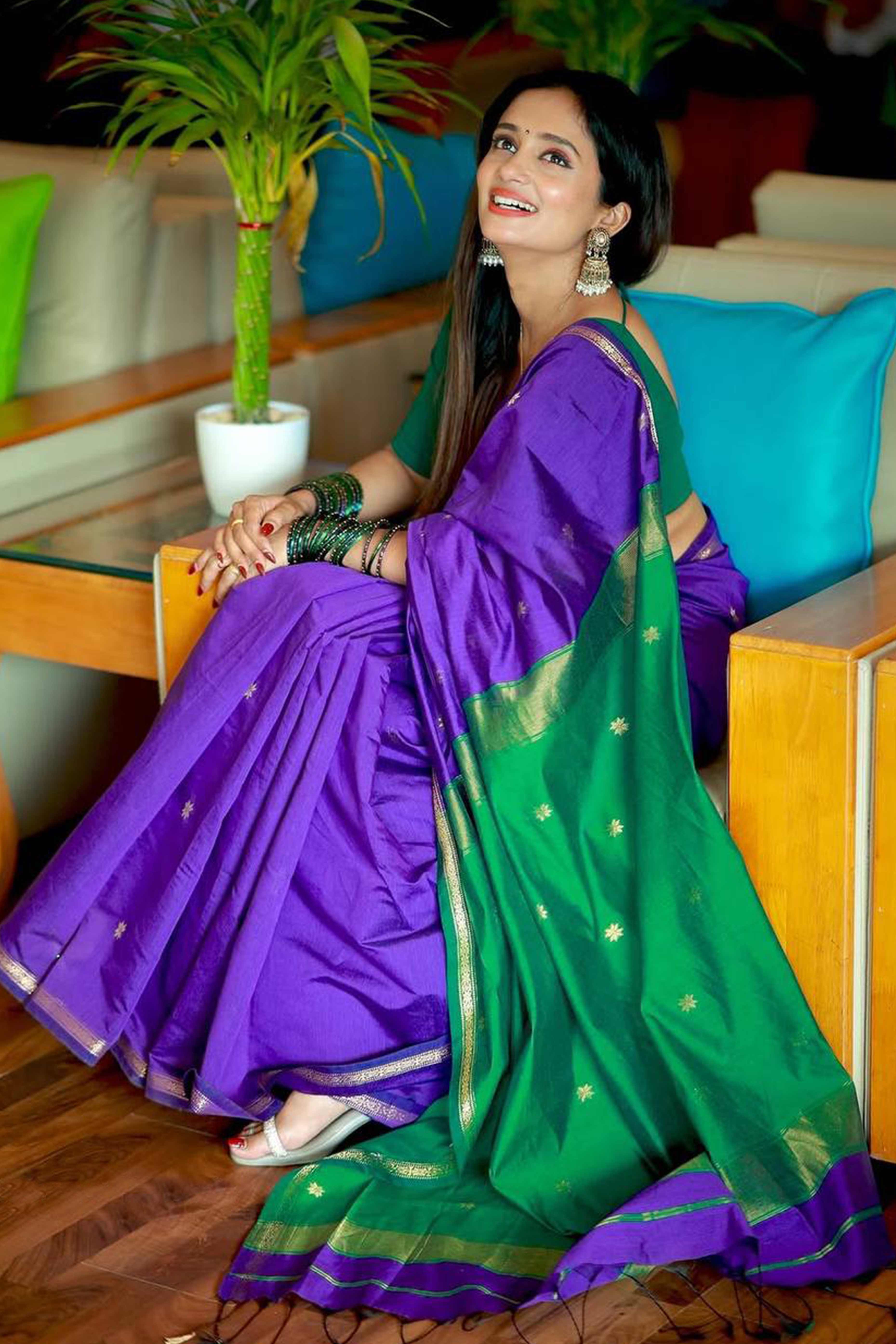 Purple Linen Cotton Saree Adorned with Intricate Zari Butti Weaving for a Refined Ethnic Appeal