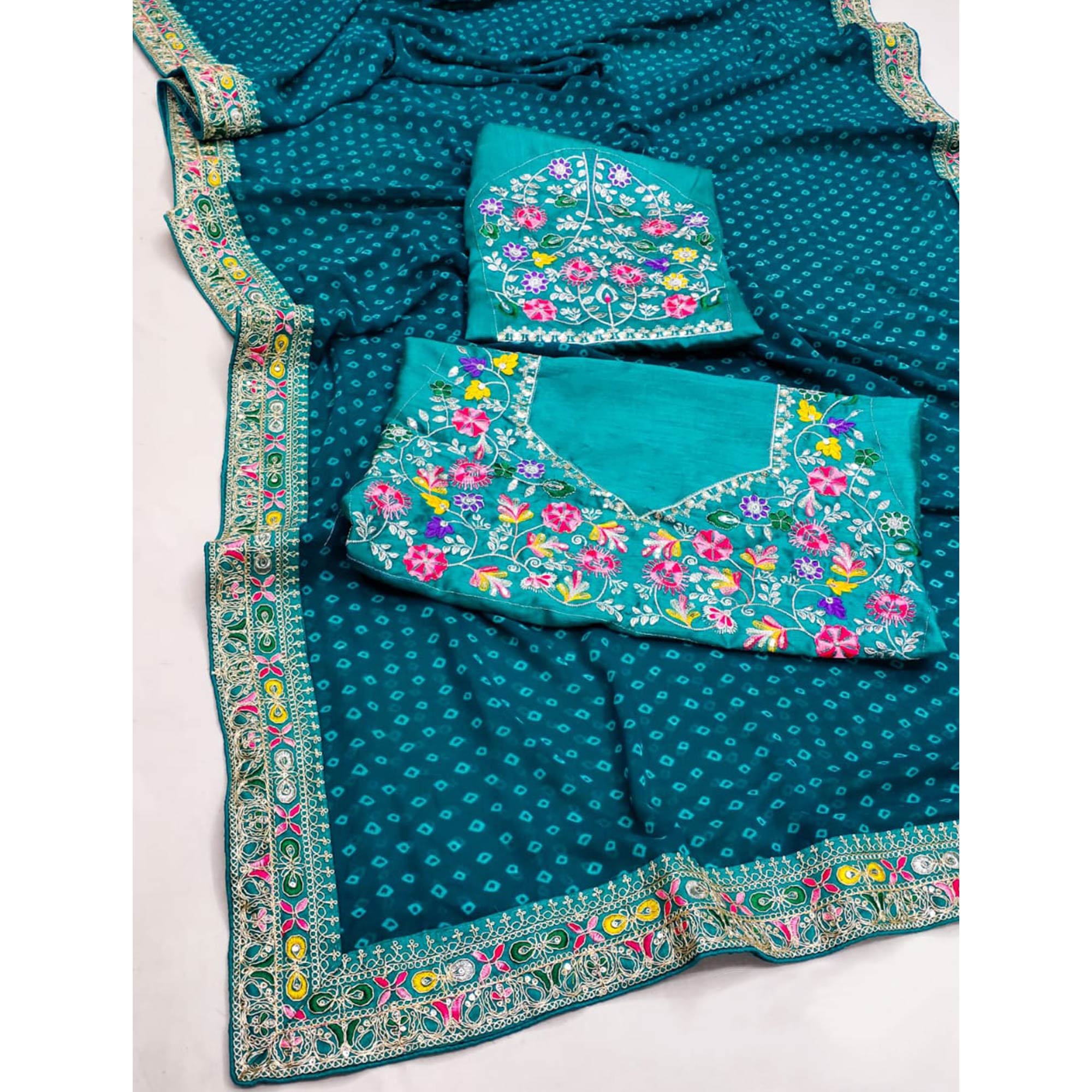 Teal Bandhani Printed Georgette Saree With Embroidered Border