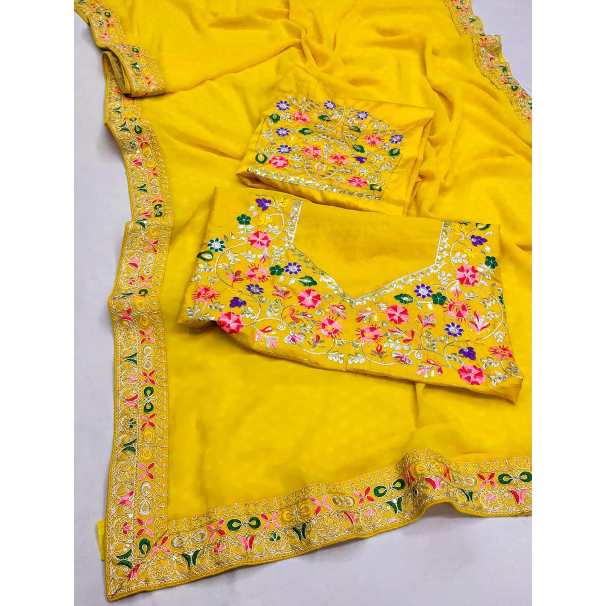 Mustard Bandhani Printed Georgette Saree With Embroidered Border
