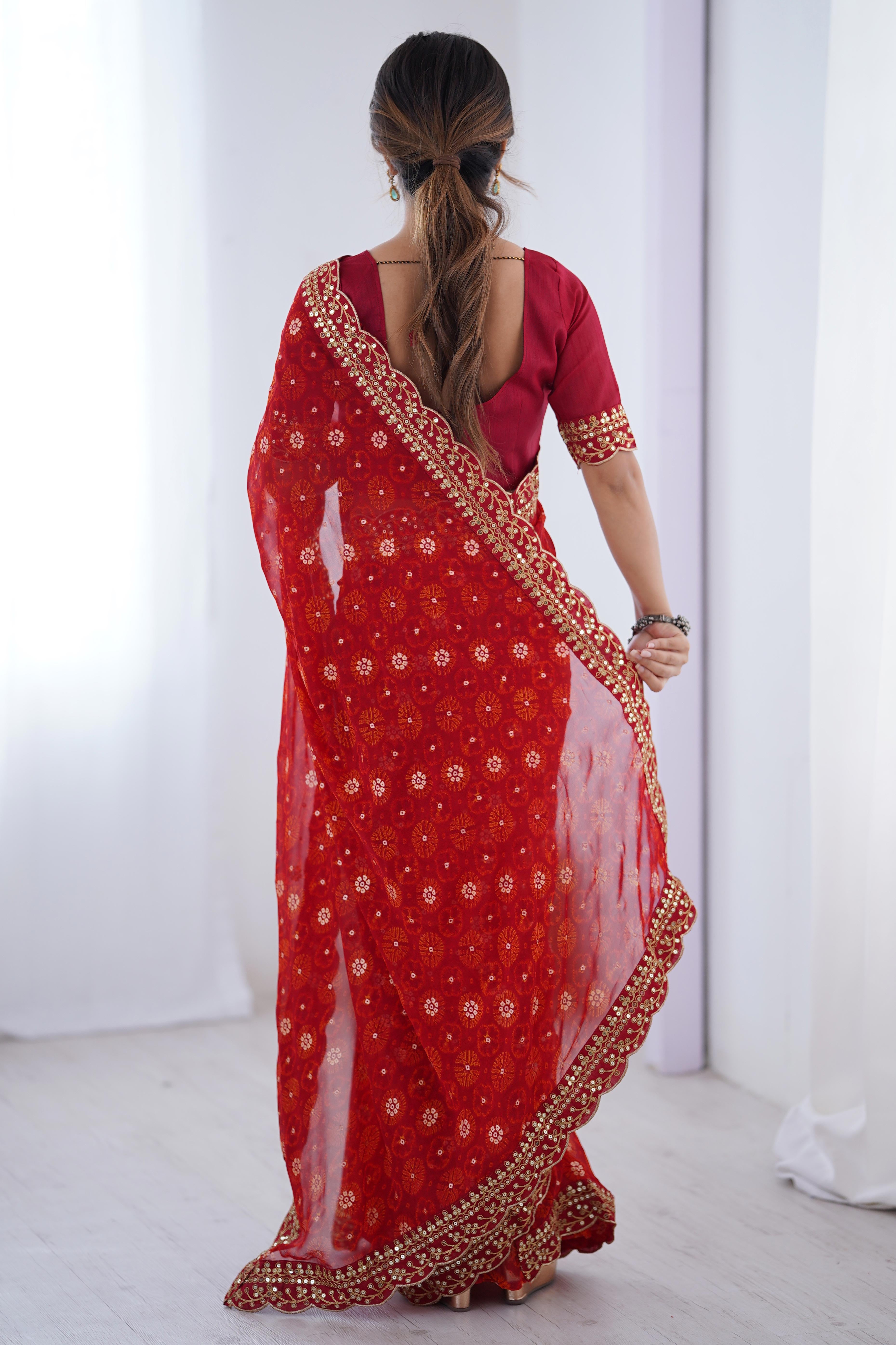Soft Georgette Red Saree with Playful Print and Delicate Sequin Lace Work