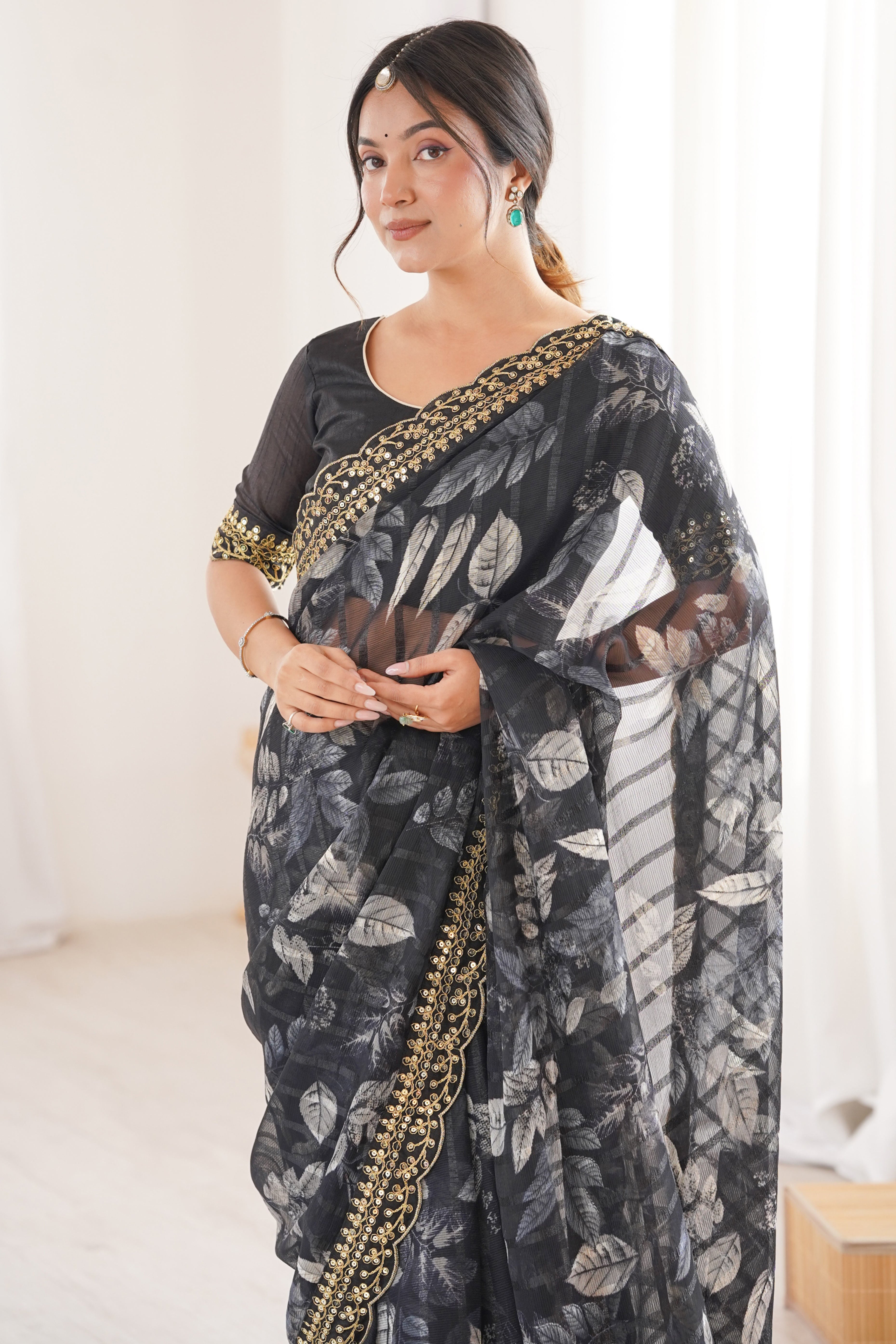 Elegant Black Leaf & Floral Print Georgette Saree With Intricate Cording Sequins Embroidery Border
