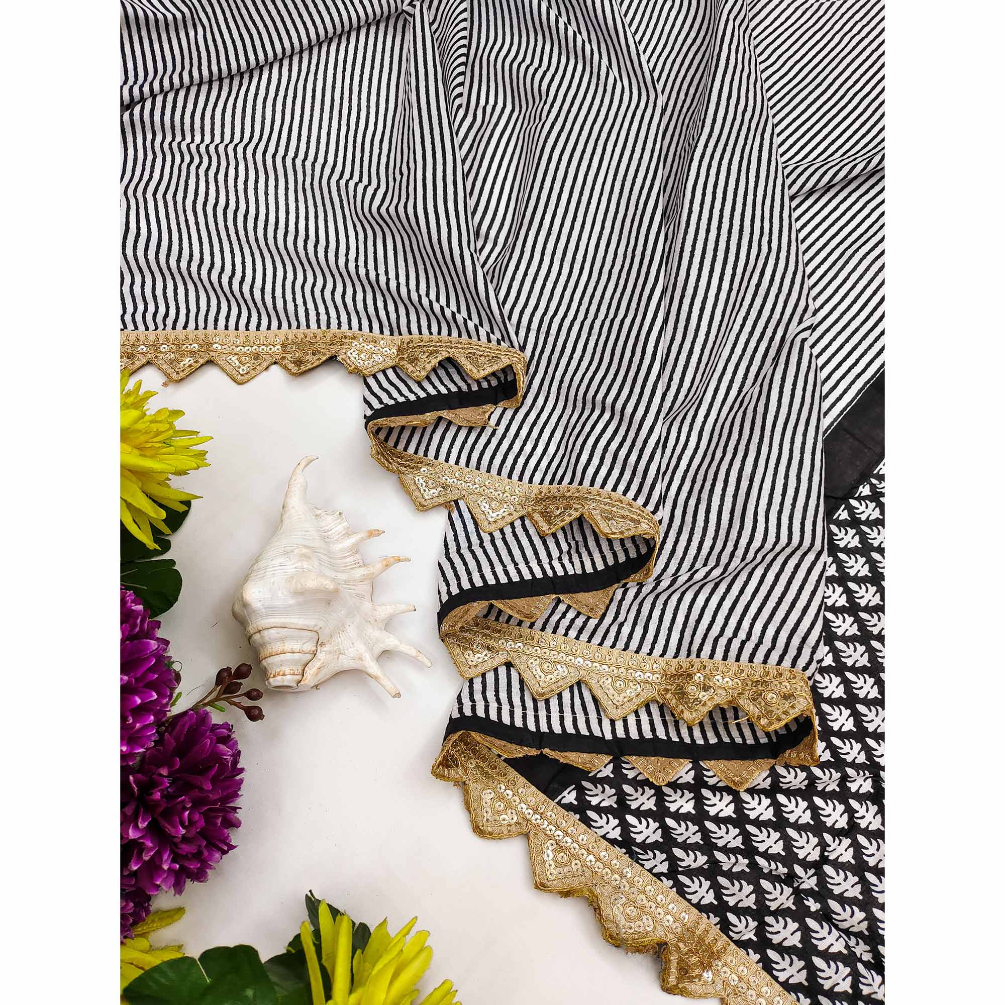 Office-Ready Black & White Mulmul Saree with Print and Embroidery Border