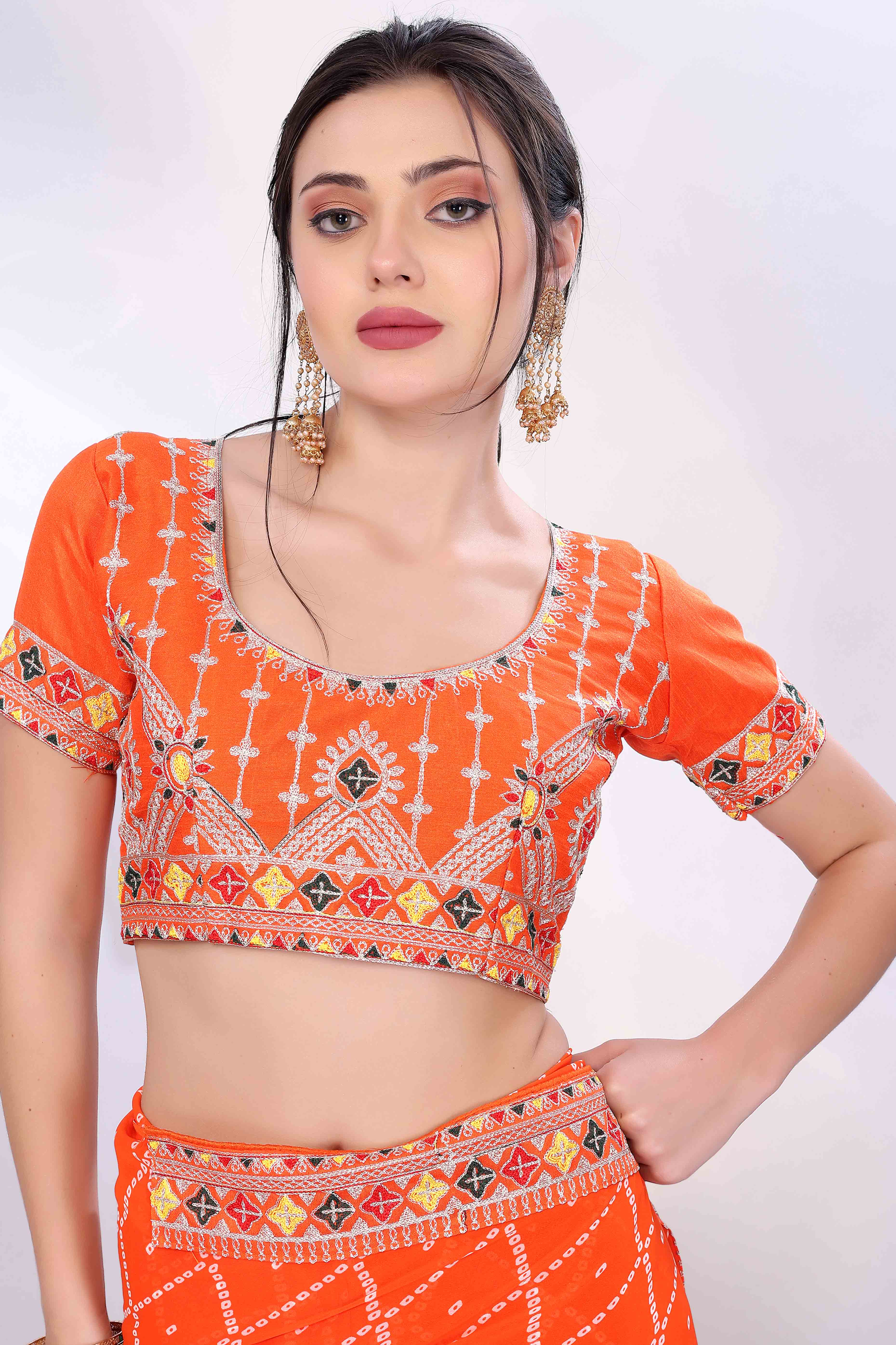 Orange Bandhani Printed Georgette Saree Framed With Elegant Embroidered Border