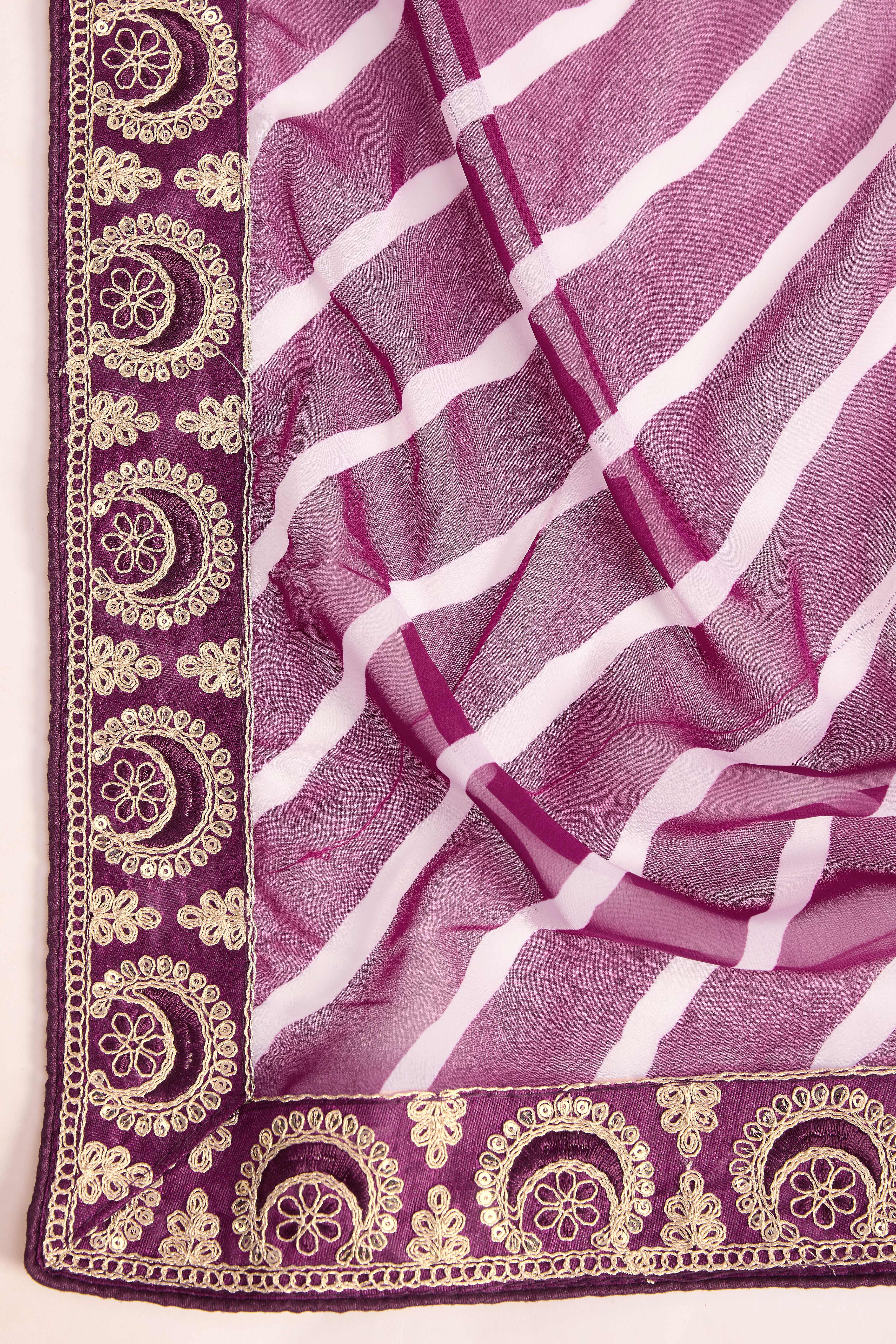 Elegant Purple Leheriya Printed Saree in Flowing Georgette
