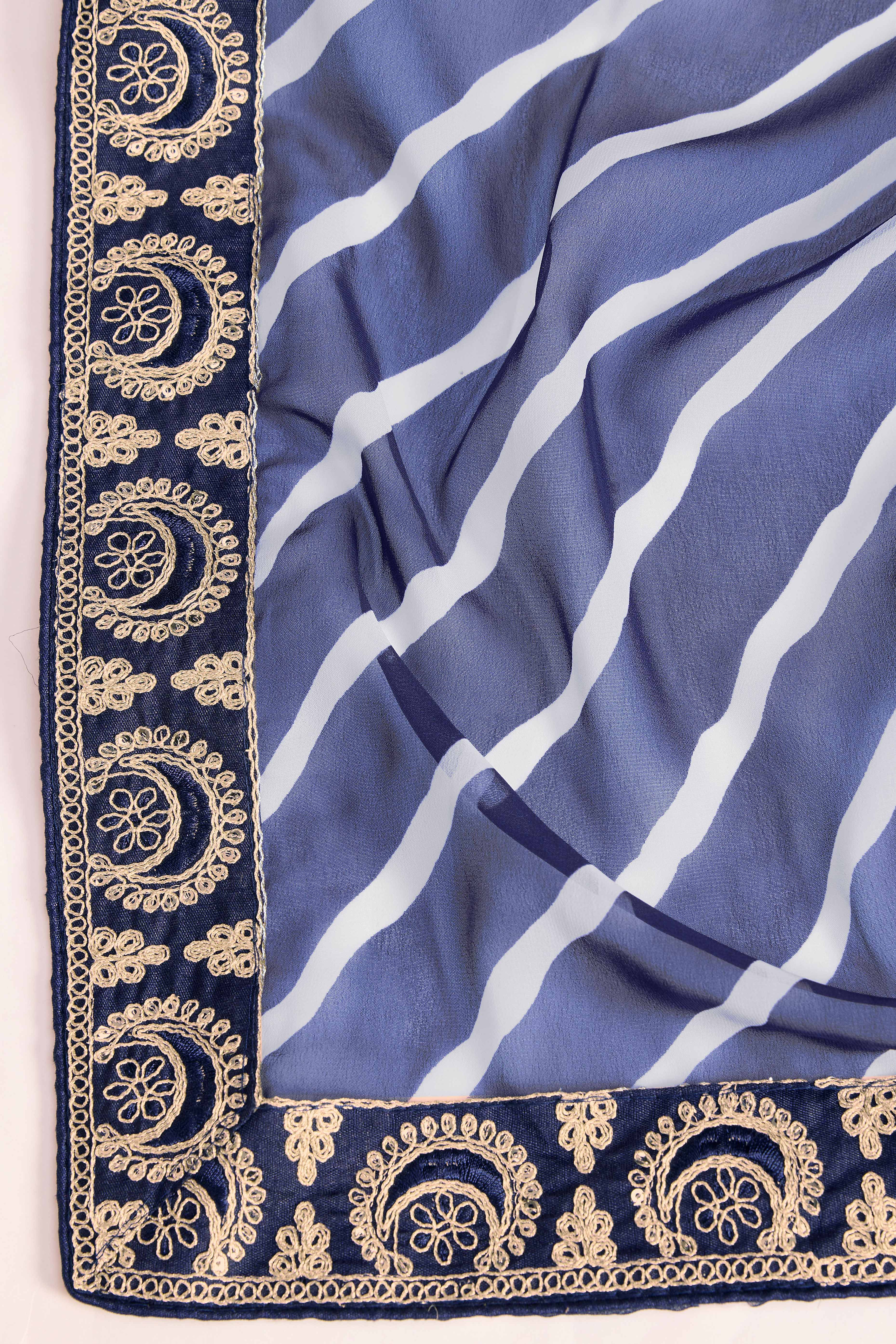 Elegant Blue Leheriya Printed Saree in Flowing Georgette