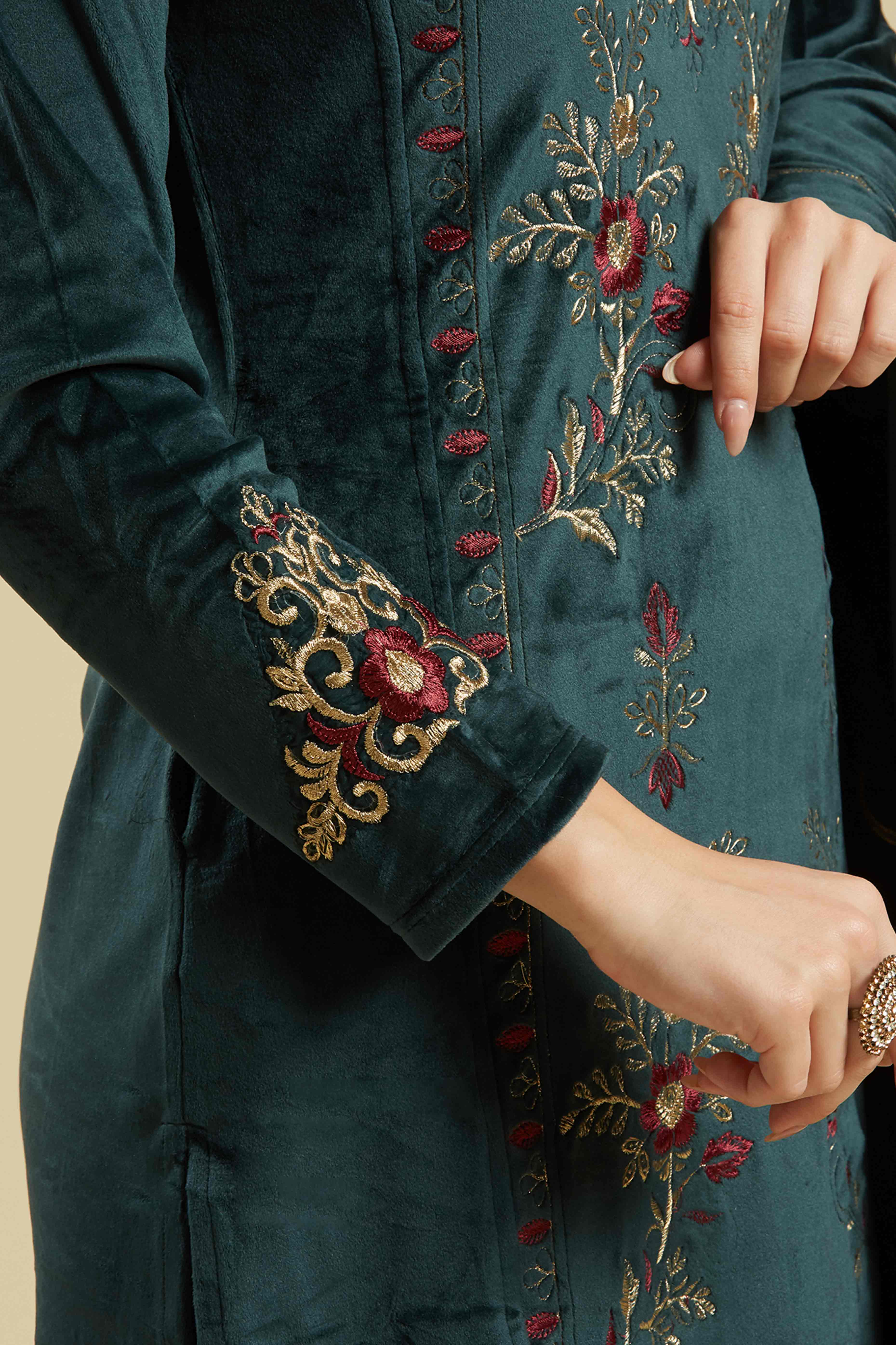 Rama Green Embroidered Velvet Straight Salwar Suit