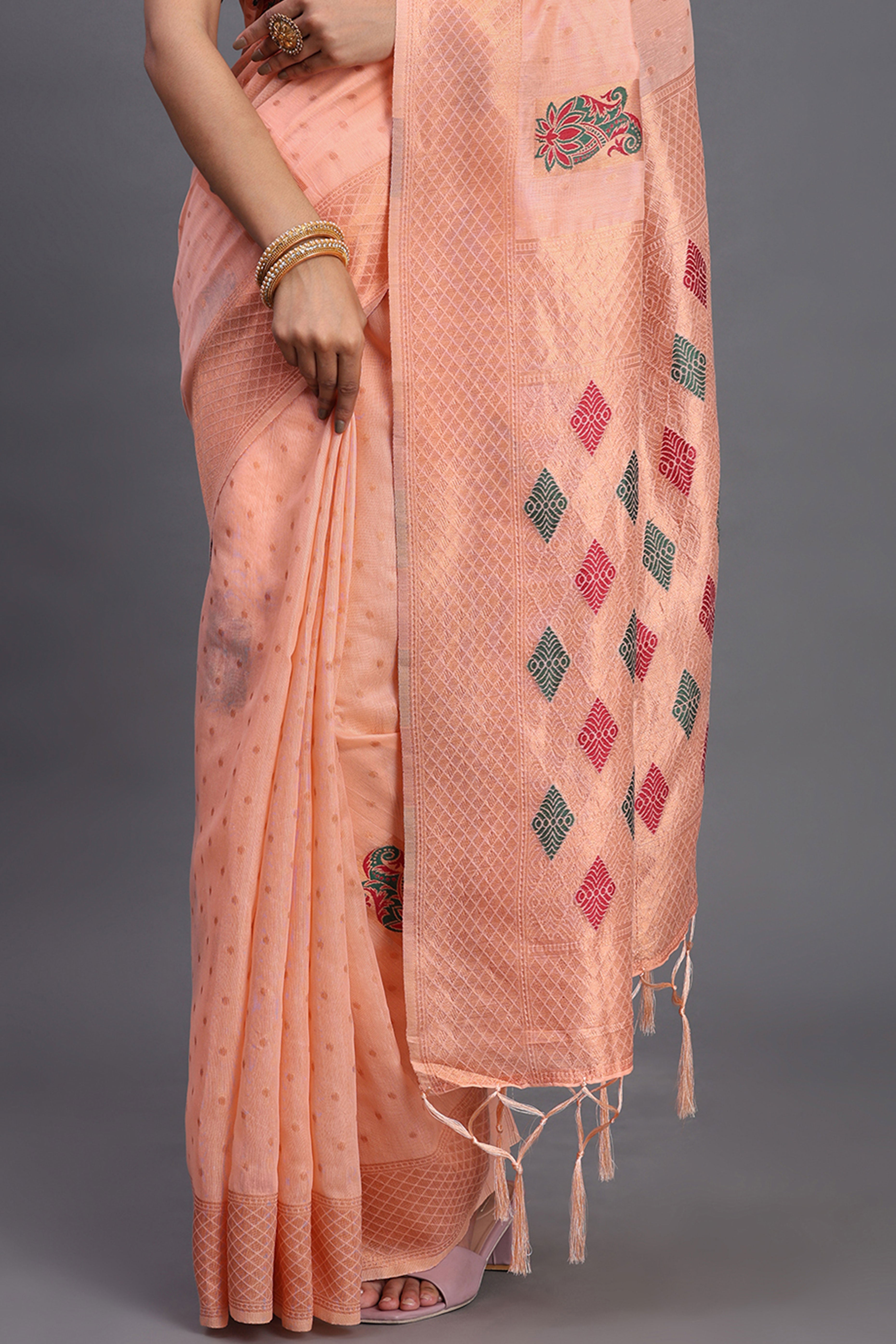 Stylish Peach Floral Zari Weaving Linen Cotton Saree With Graceful Tassel Pallu