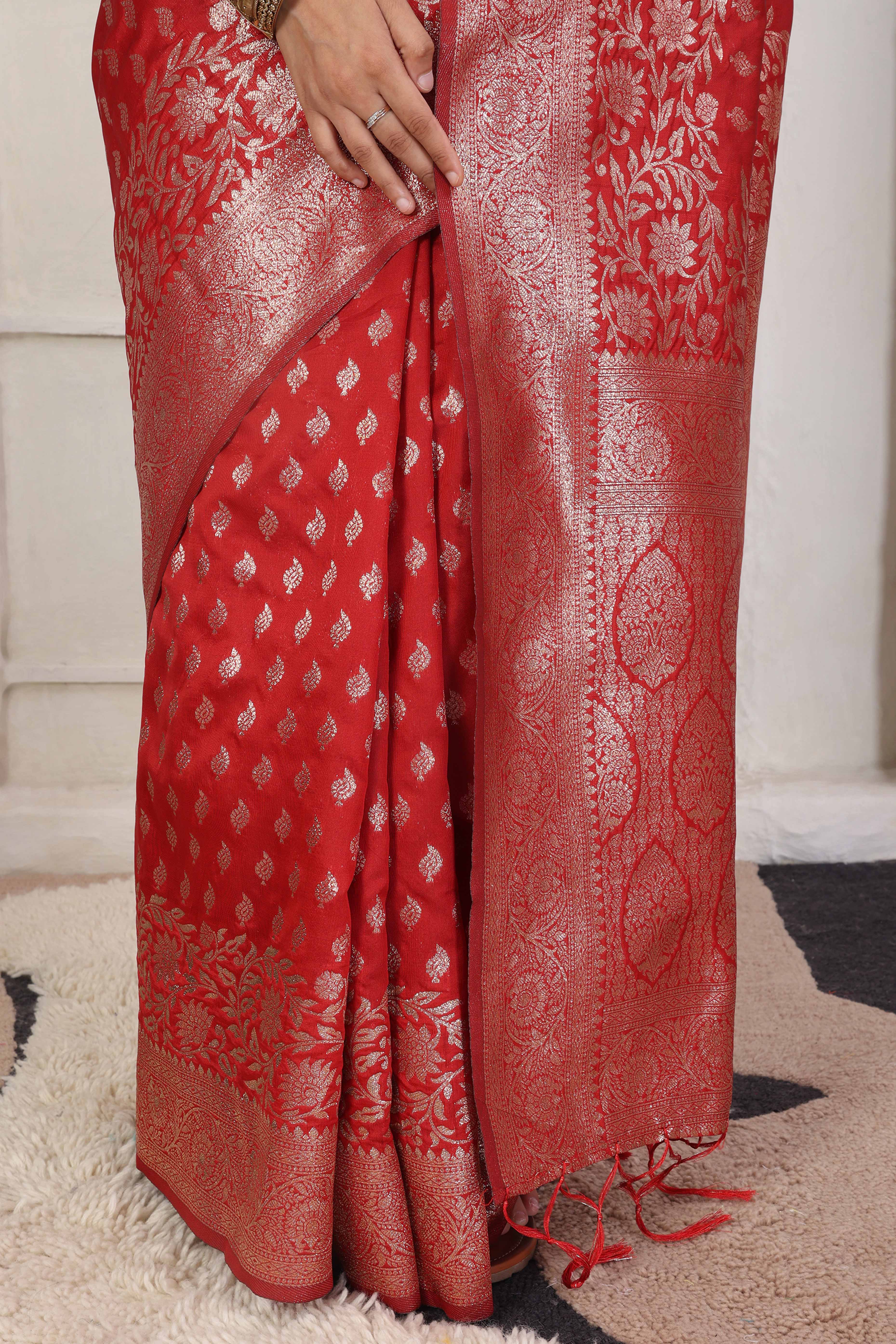 Red Traditional Lichi Silk Blend Saree Enhanced With Floral Zari Weaving & Tassel Pallu