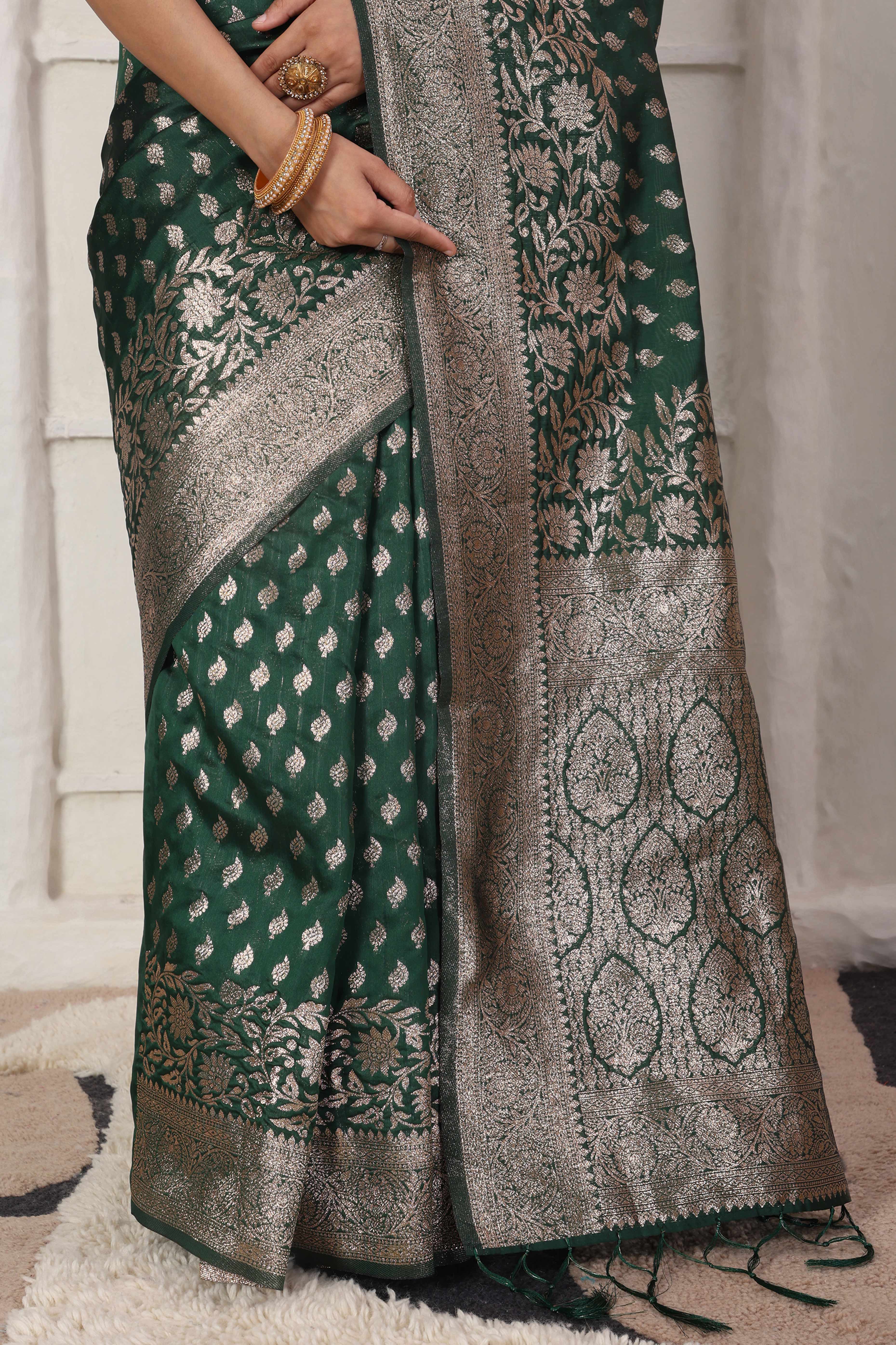 Green Traditional Lichi Silk Blend Saree Enhanced With Floral Zari Weaving & Tassel Pallu