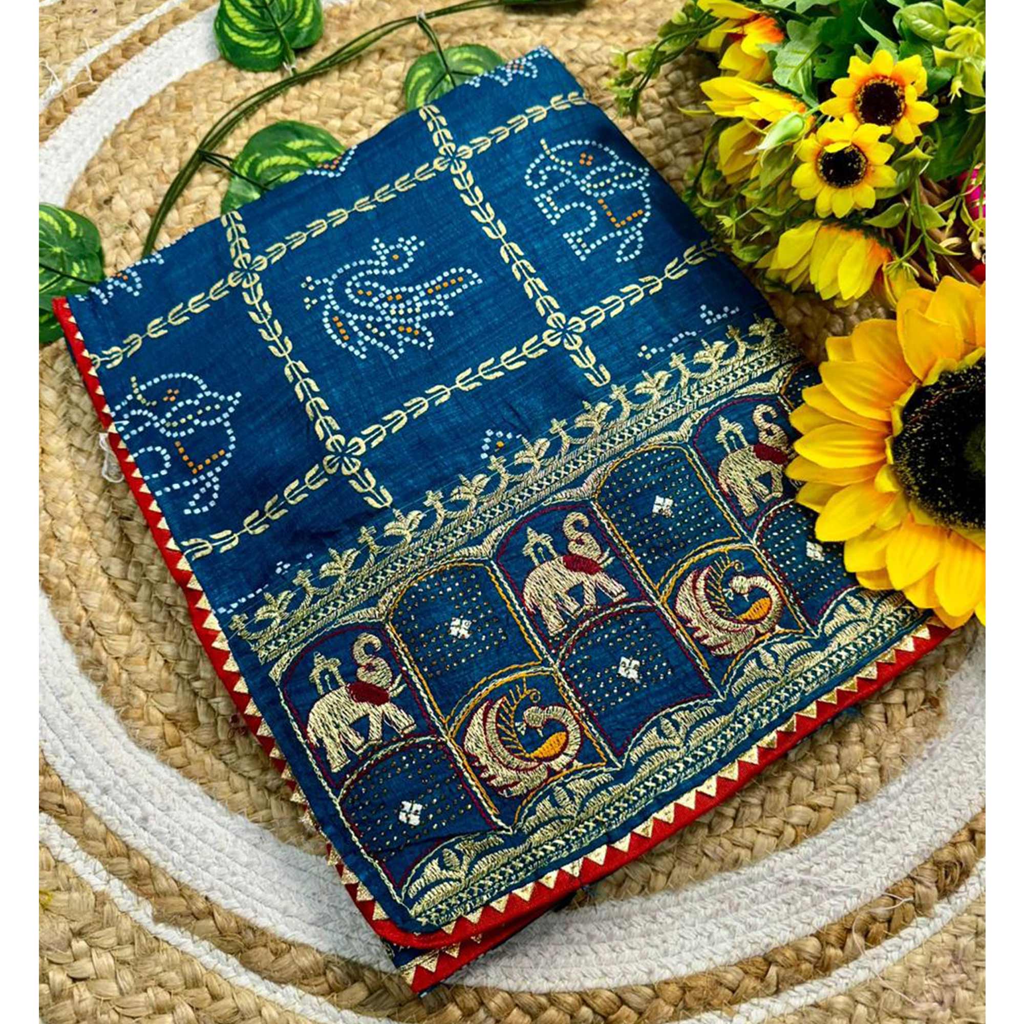 Blue Vichitra Silk Saree Featuring Bandhani Patterns and Graceful Embroidered Borders