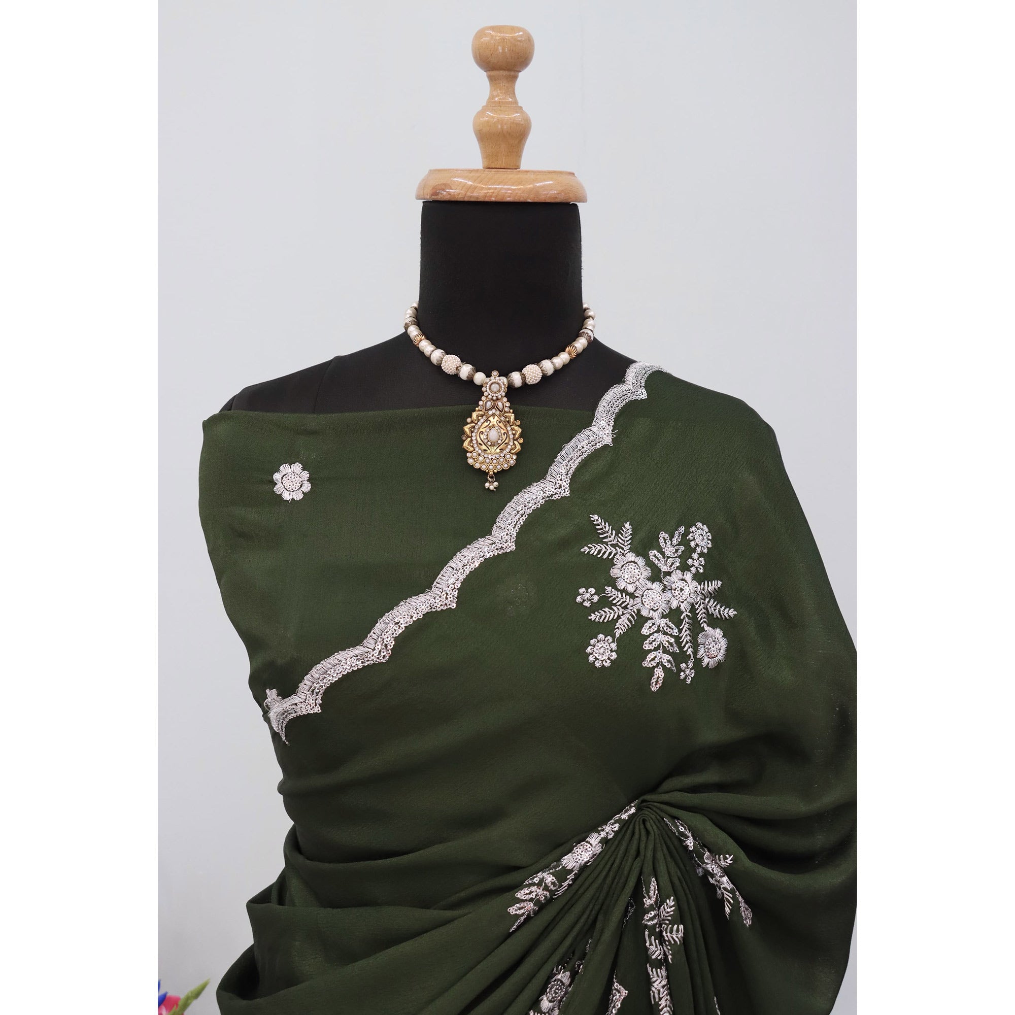 Green Chinon Saree Adorned With Zari Floral Embroidery & Gleaming Sequins Work