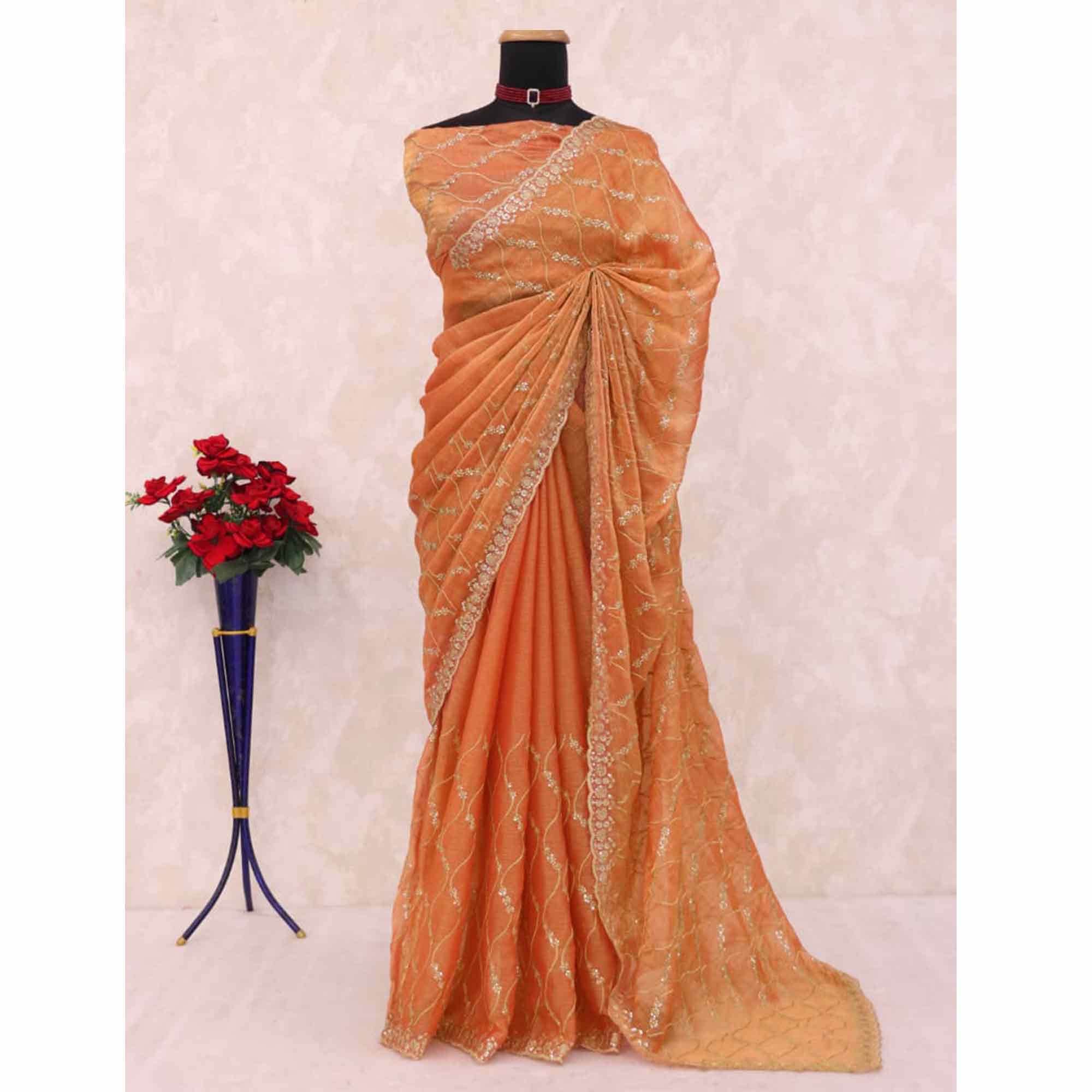 Orange Partywear Organza Chiffon Silk Saree Highlighted with Fine Sequins Detailing
