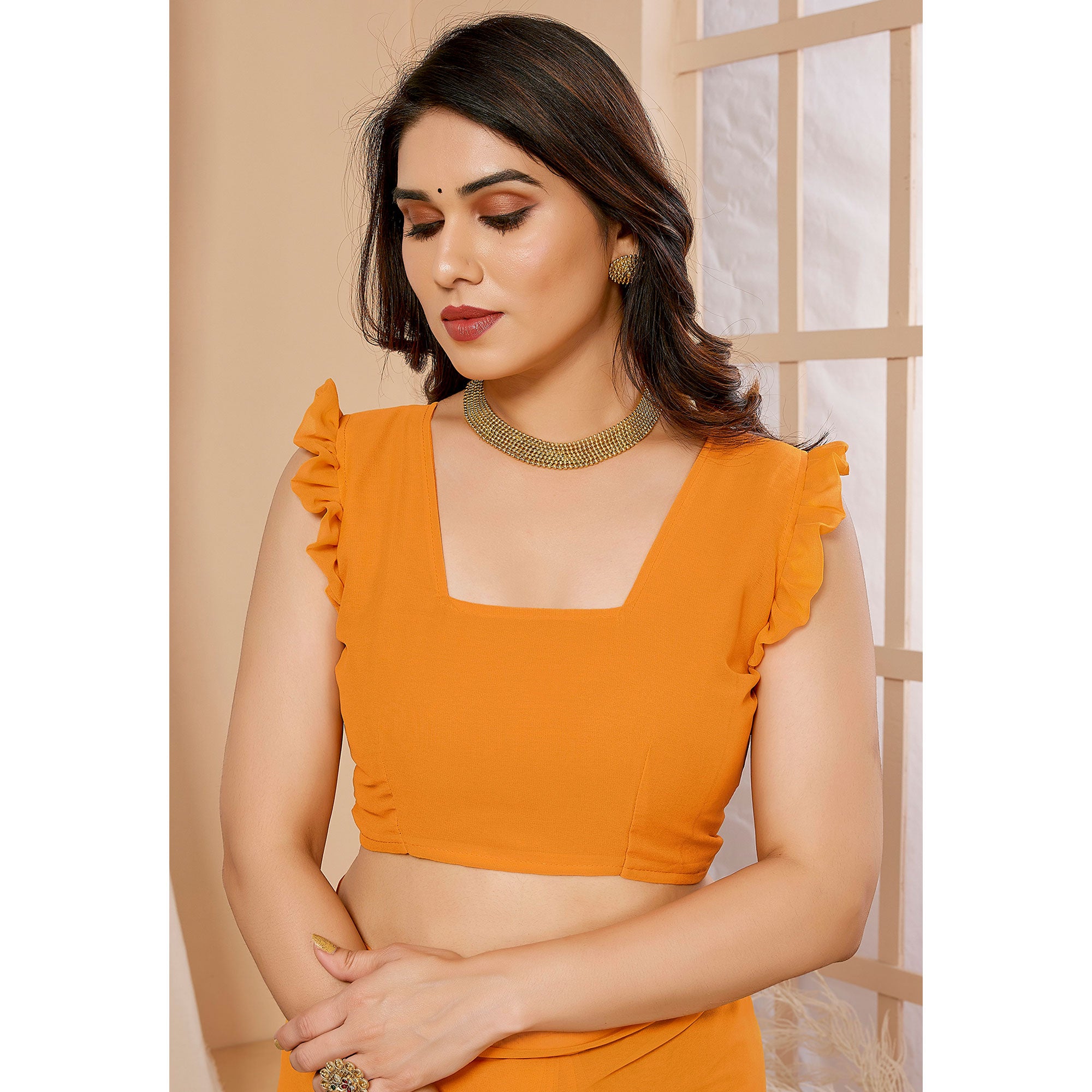 Orange Solid Georgette Saree With Printed Ruffle Border