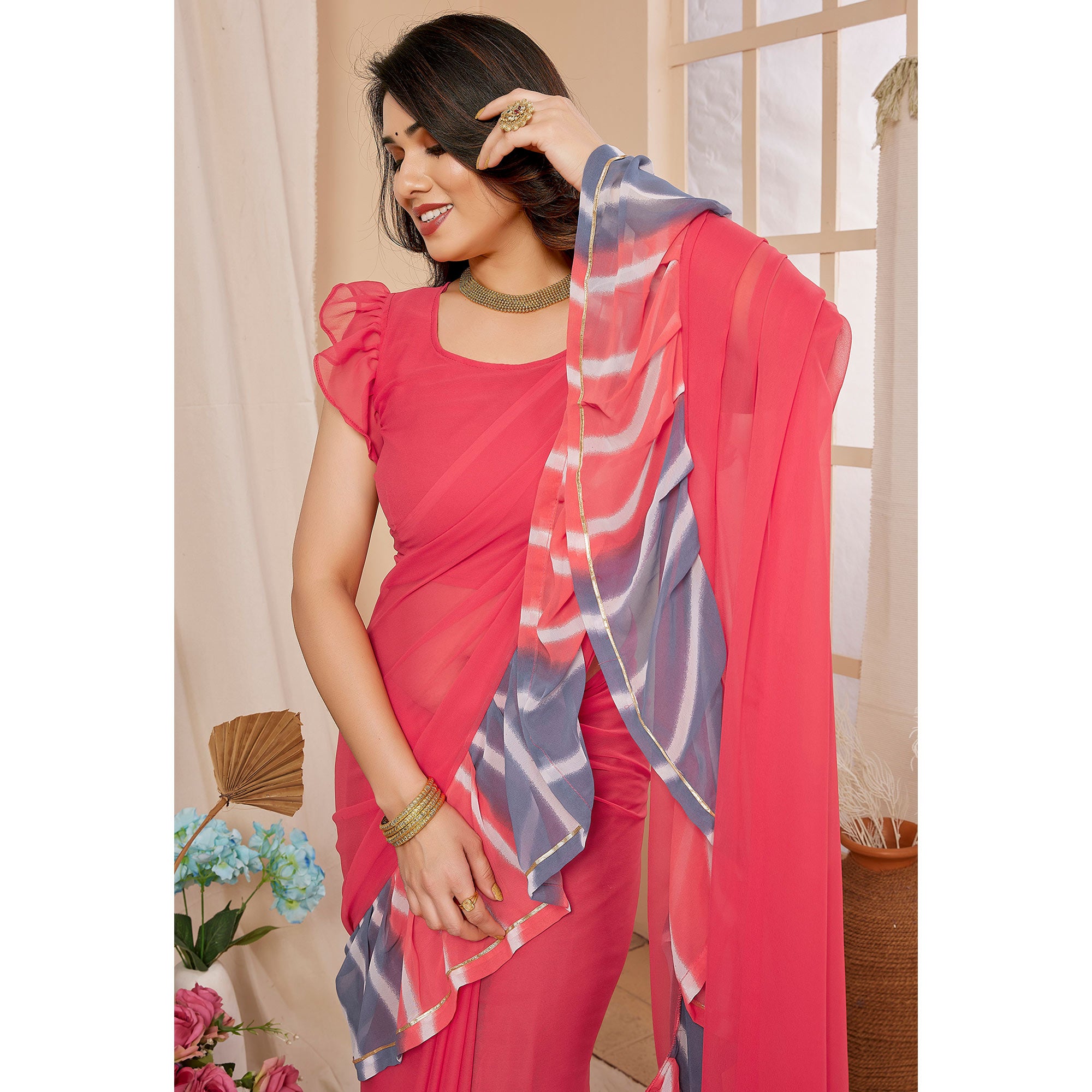 Pink Solid Georgette Saree With Printed Ruffle Border