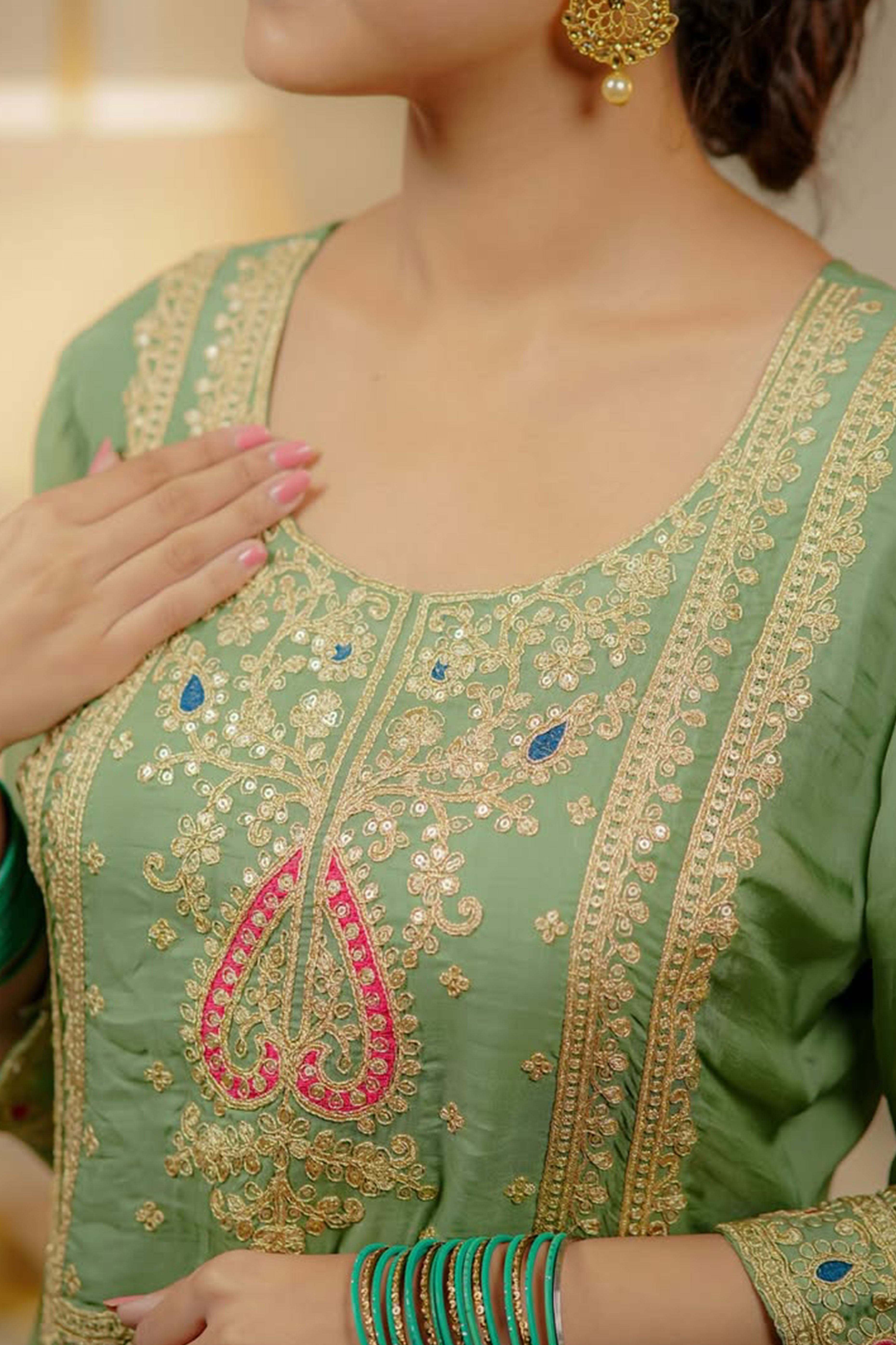 Green Organza Suit Accented with Thread & Sequins Work