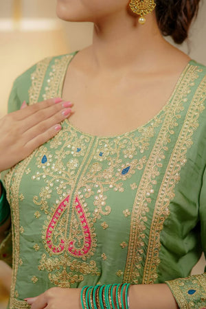 Green Organza Suit Accented with Thread & Sequins Work