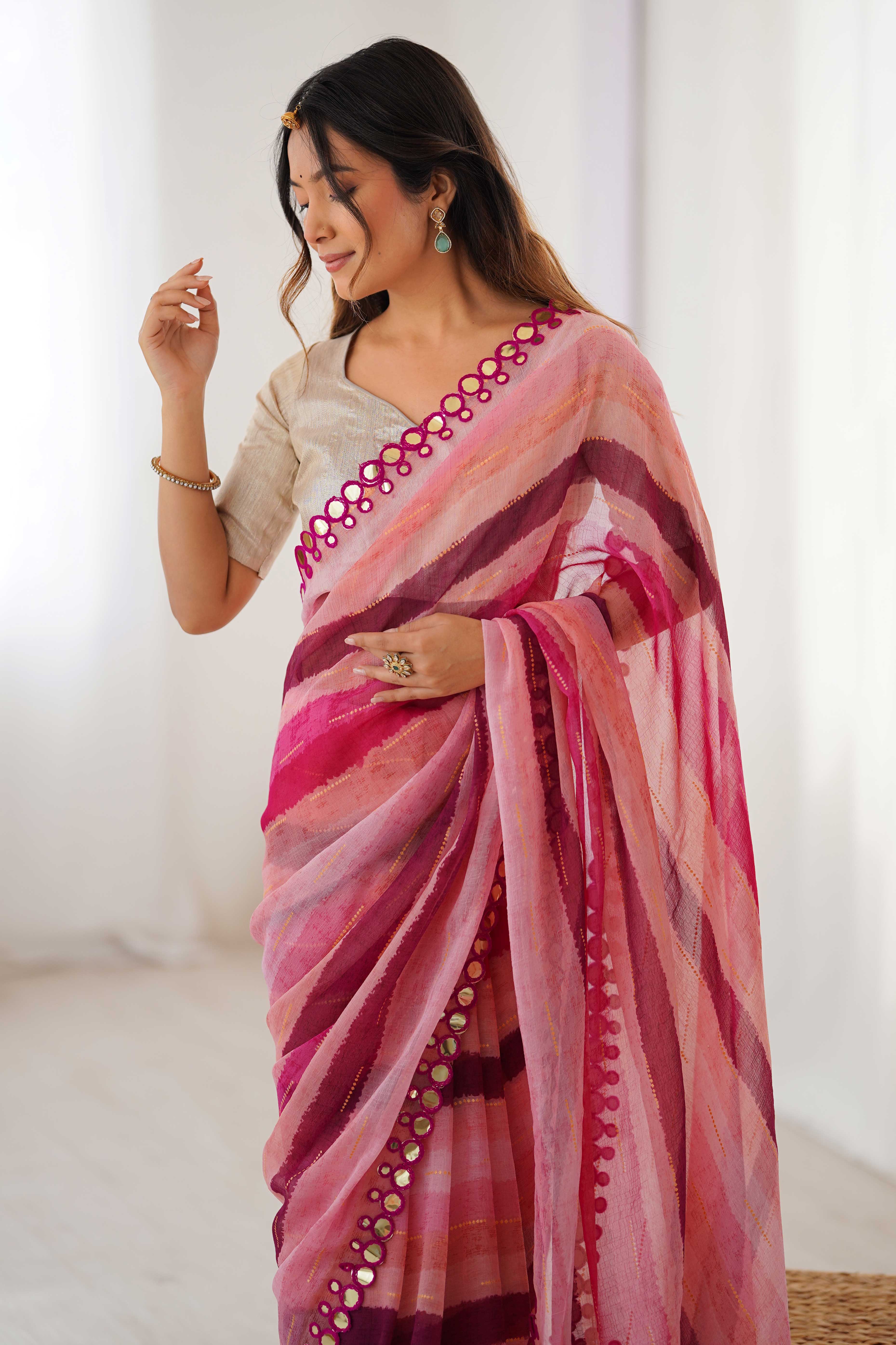 Soft Chiffon Pink Saree Featuring Classic Leheriya and Mirror Work Edges