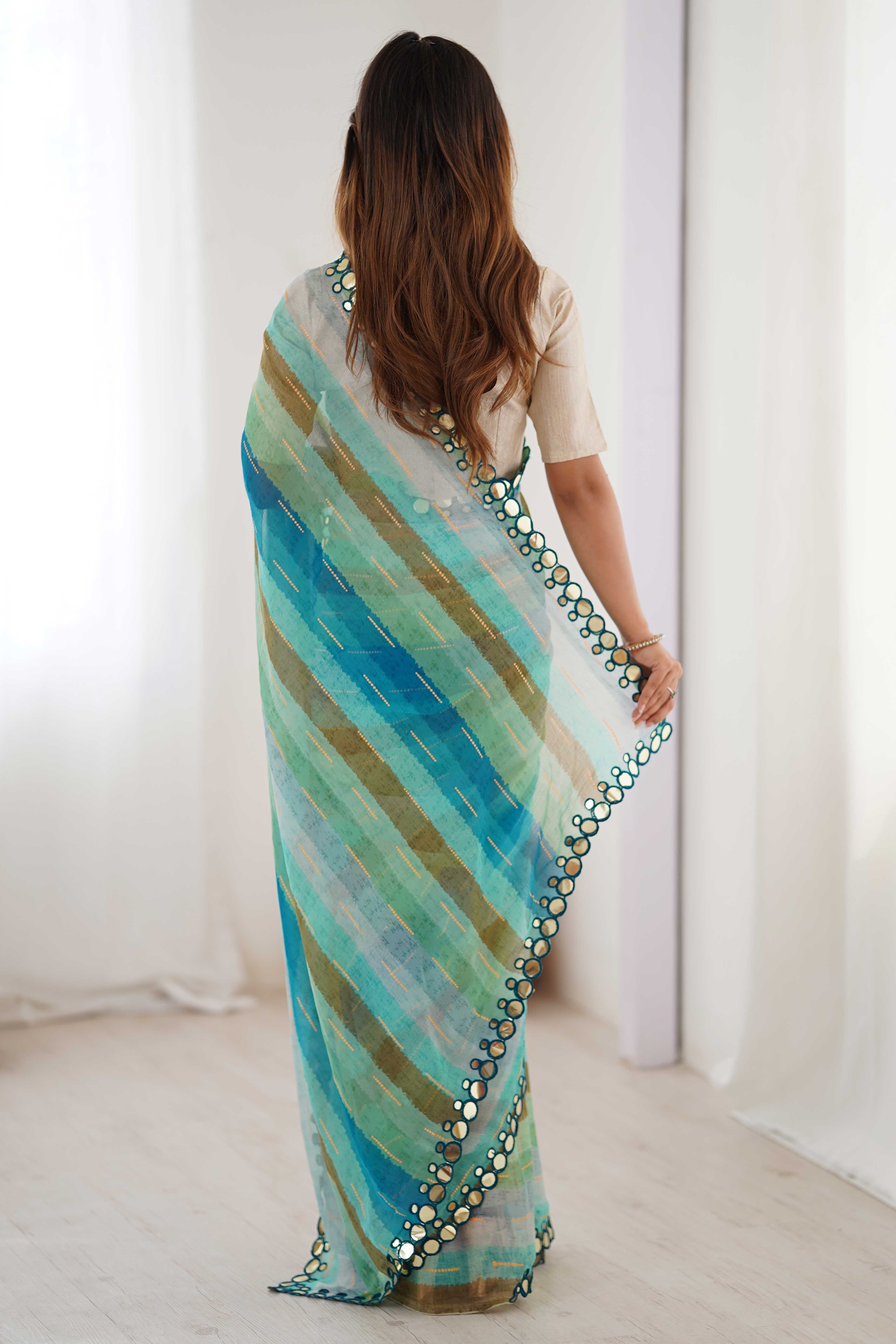 Soft Chiffon Turquoise Saree Featuring Classic Leheriya and Mirror Work Edges