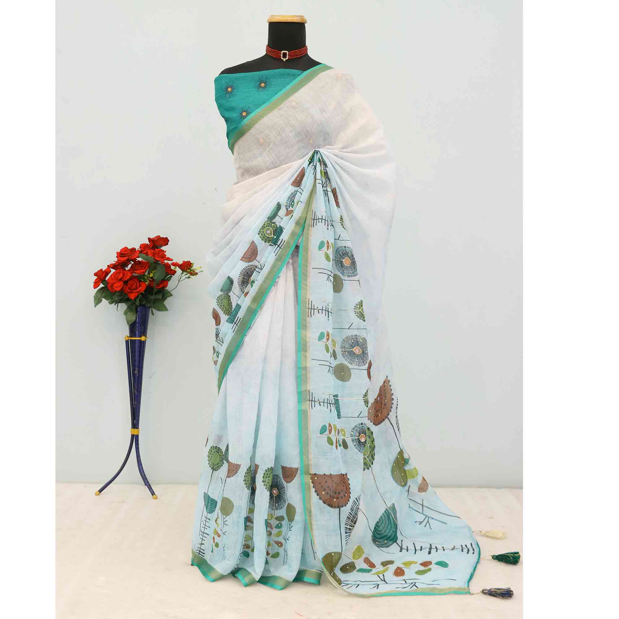 Sky Blue Pure Soft Linen Saree with Elegant Prints and Delicate Stone Work Embellishment