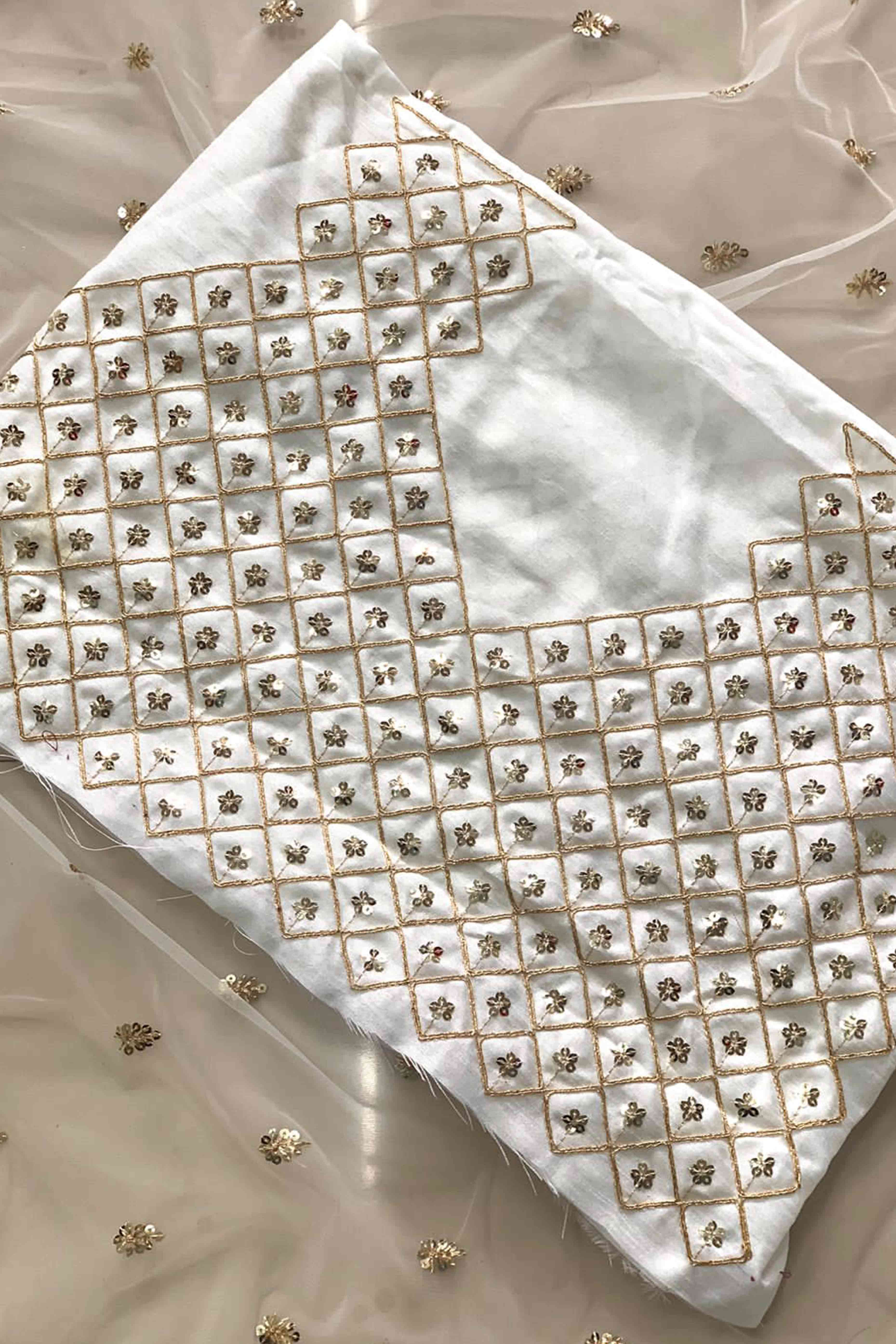 Graceful Off White Sequins Embellished Net Saree for Partywear